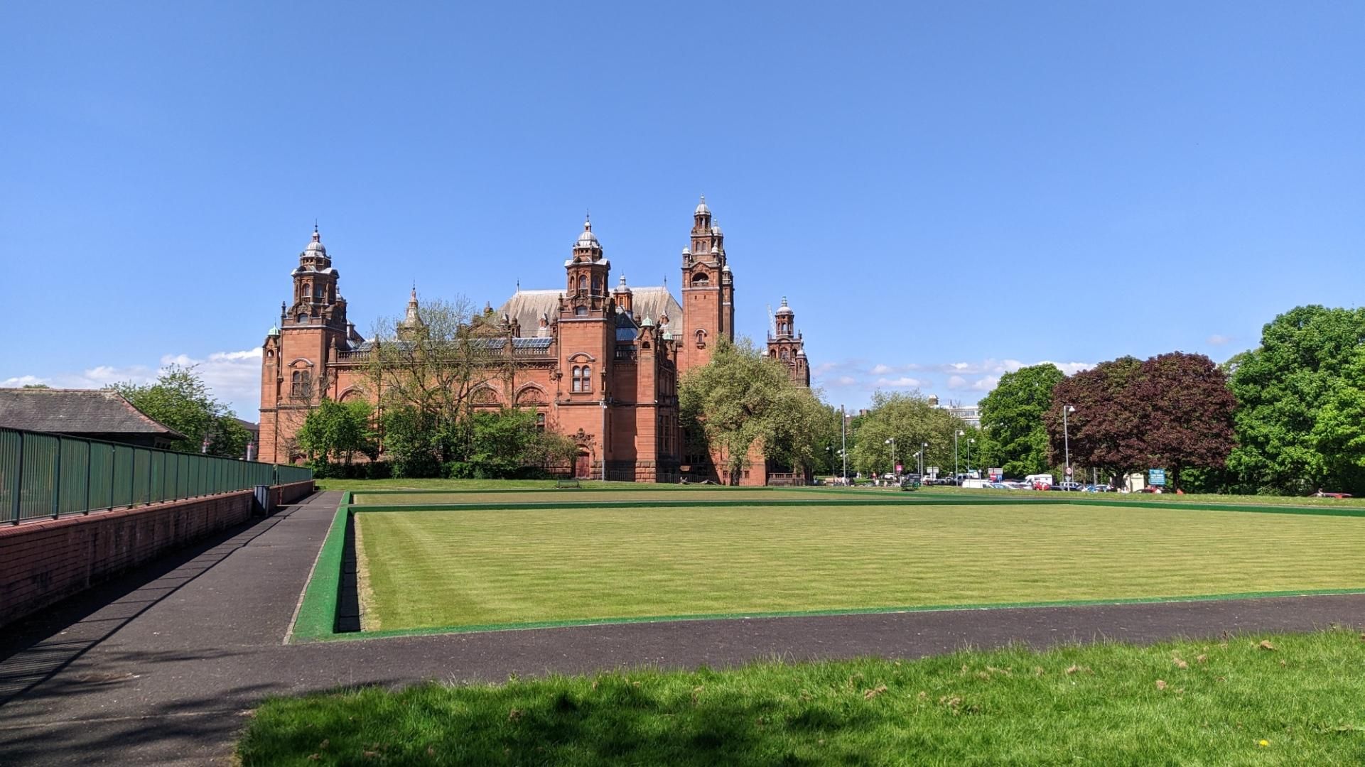 Kelvimgrove, a large red sandstone building with towers in each corners