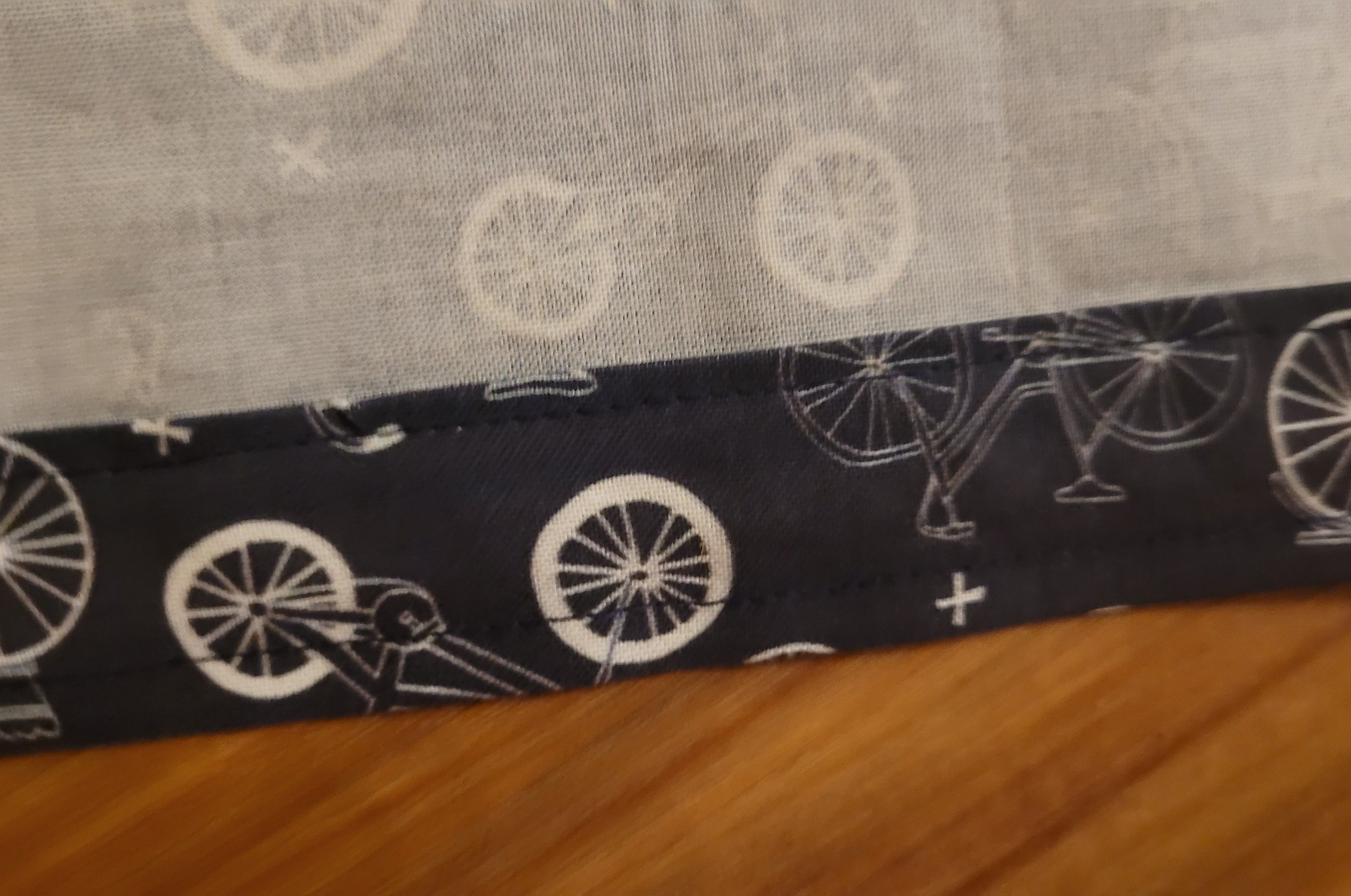 Hem on bicycle shirt on floor