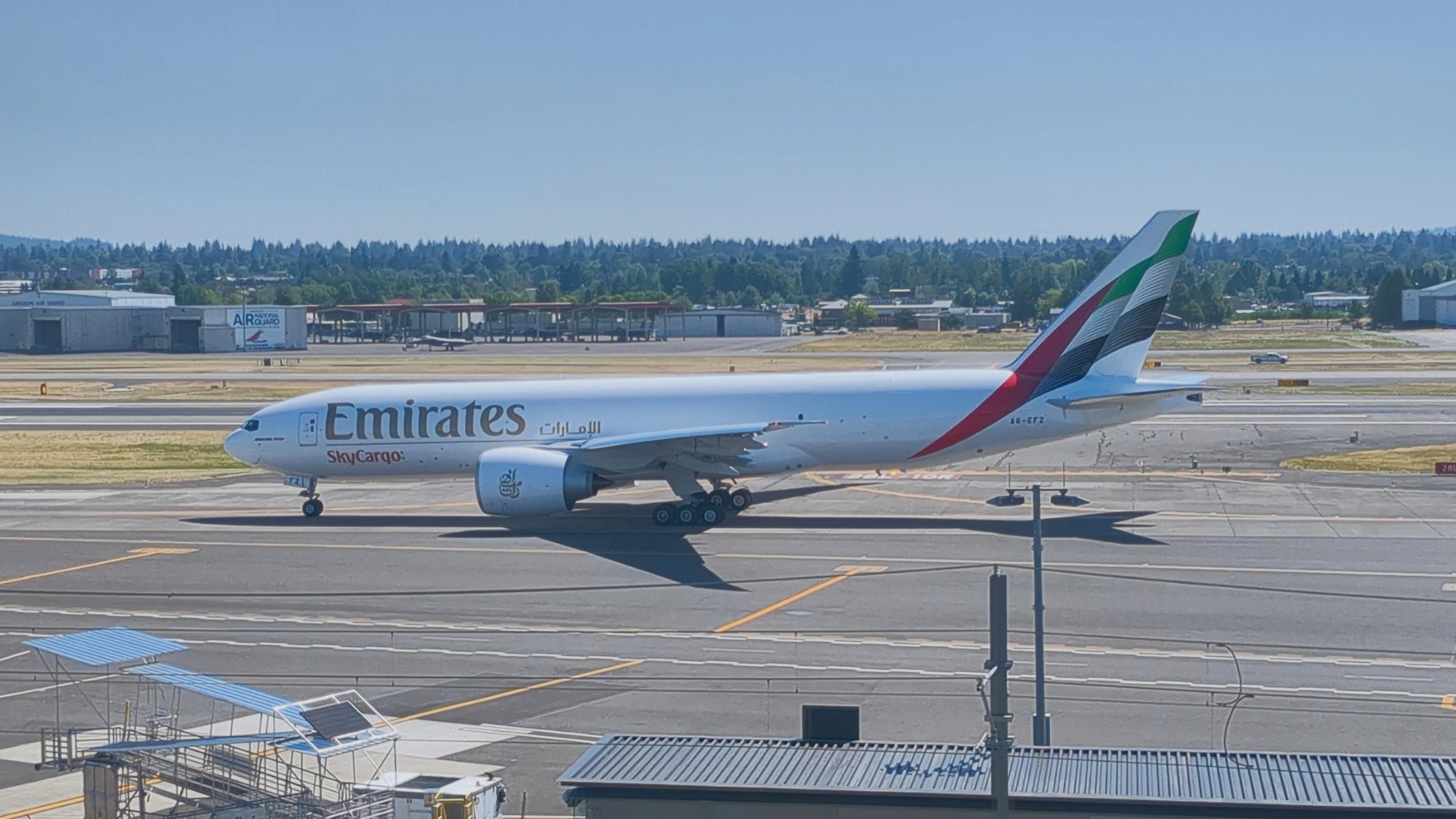 A new Boeing 777-200LR/F freighter taxiing from the Boeing Portland Paint Hangar at Portland Int'l Airport PDX for departure to Boeing Field BFI in Seattle where the customer will complete the purchase and take delivery of the plane.
photo by Ian Kluft
July 24, 2025
Portland, Oregon, USA