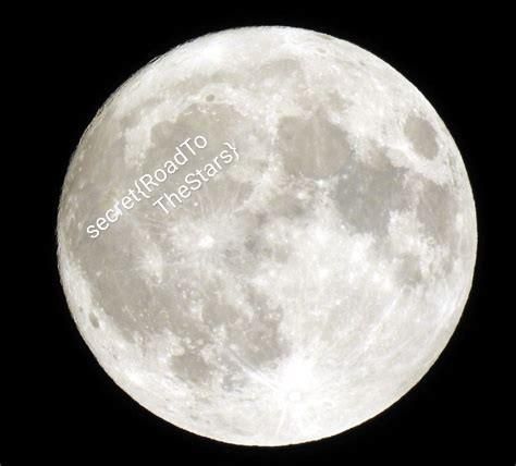 A closeup of the moon. Barely visible, there's text written on it: "secret{RoadToTheStars}"