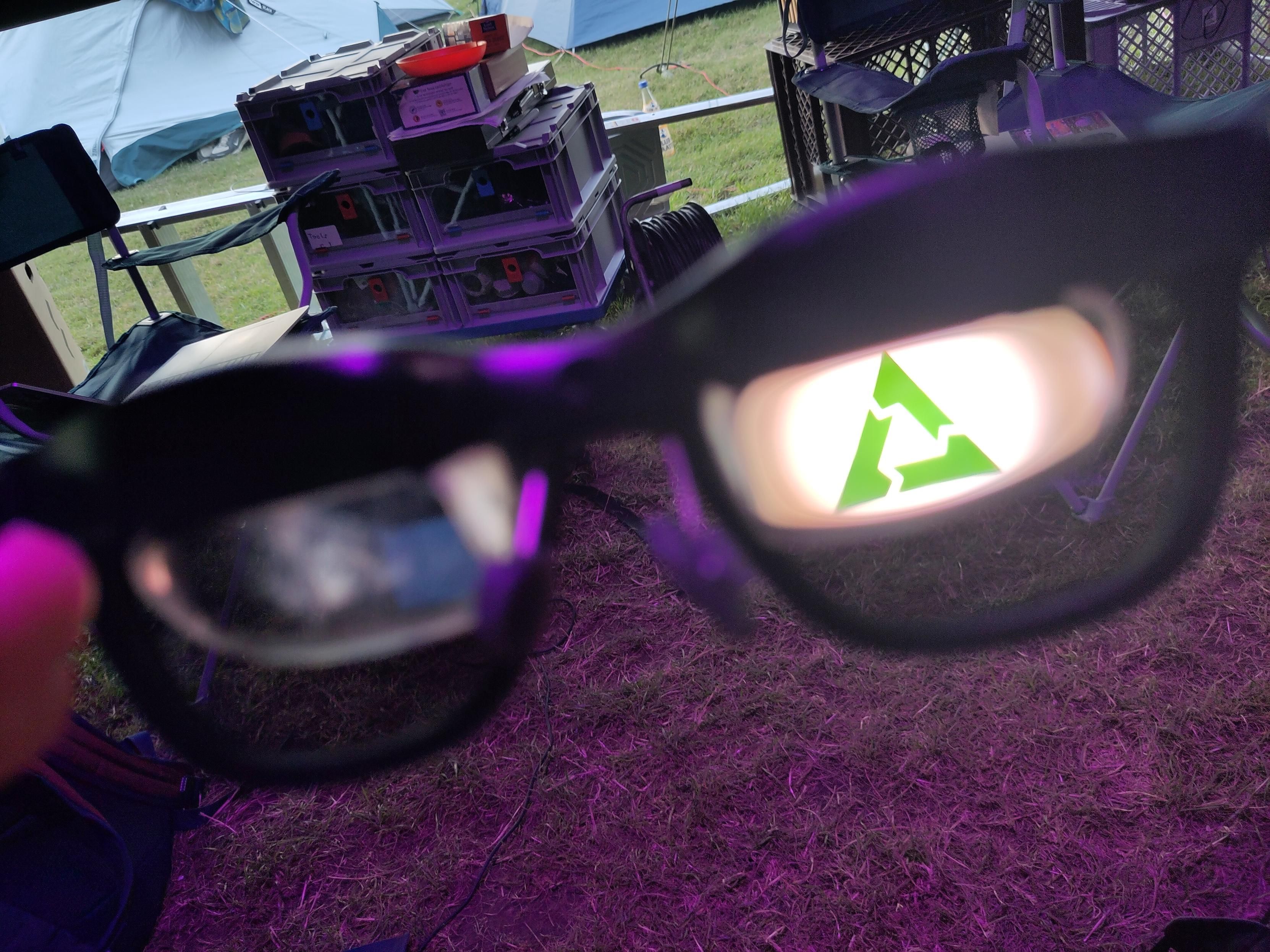 postmarketOS logo visible on the glasses