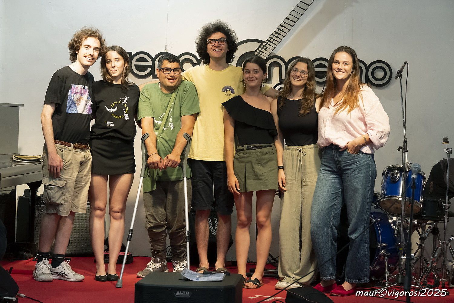 A photo of me on stage with other six members of the Scambi staff.