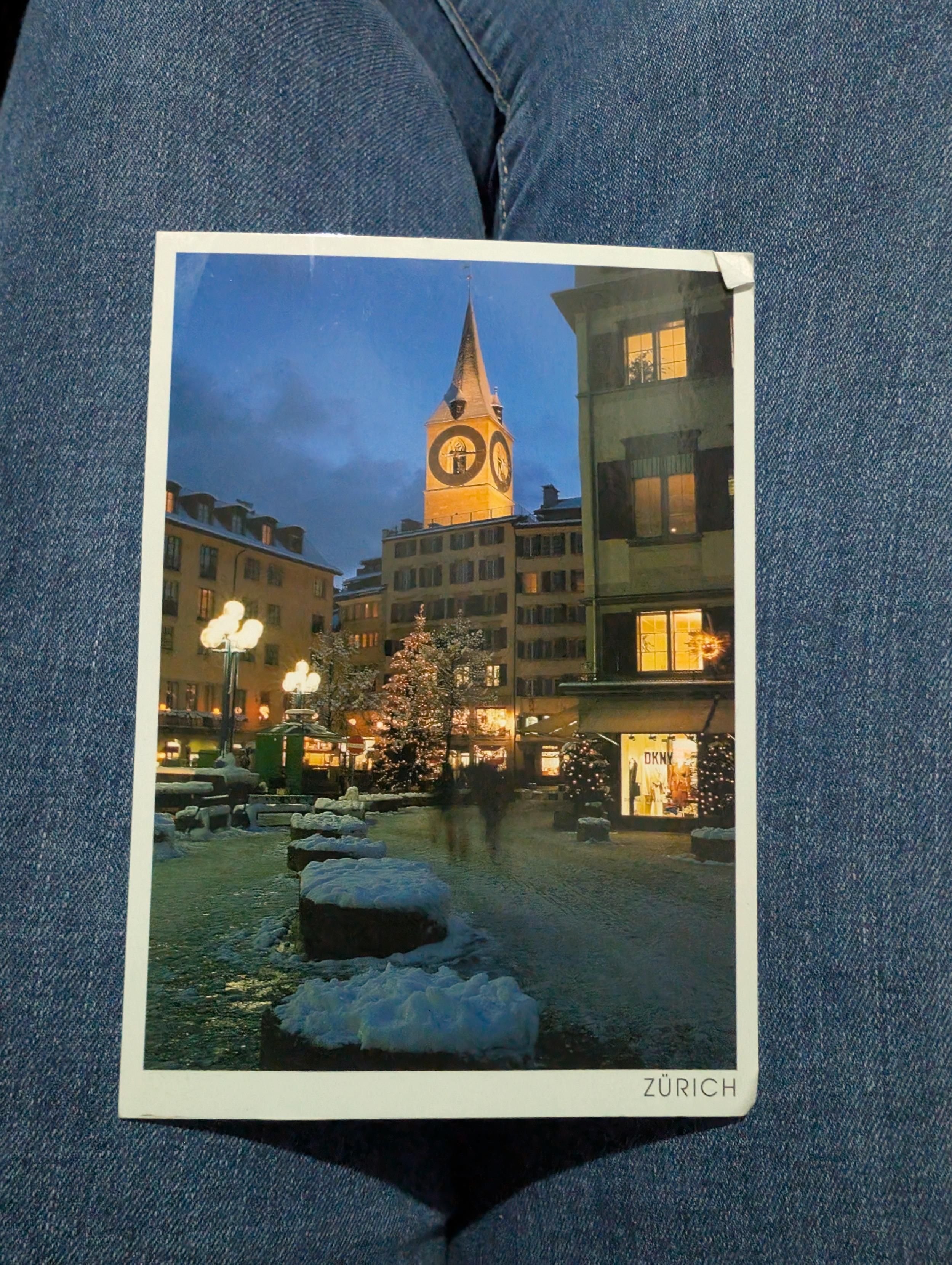 I picture a postcard of the biggest clock face in Europe