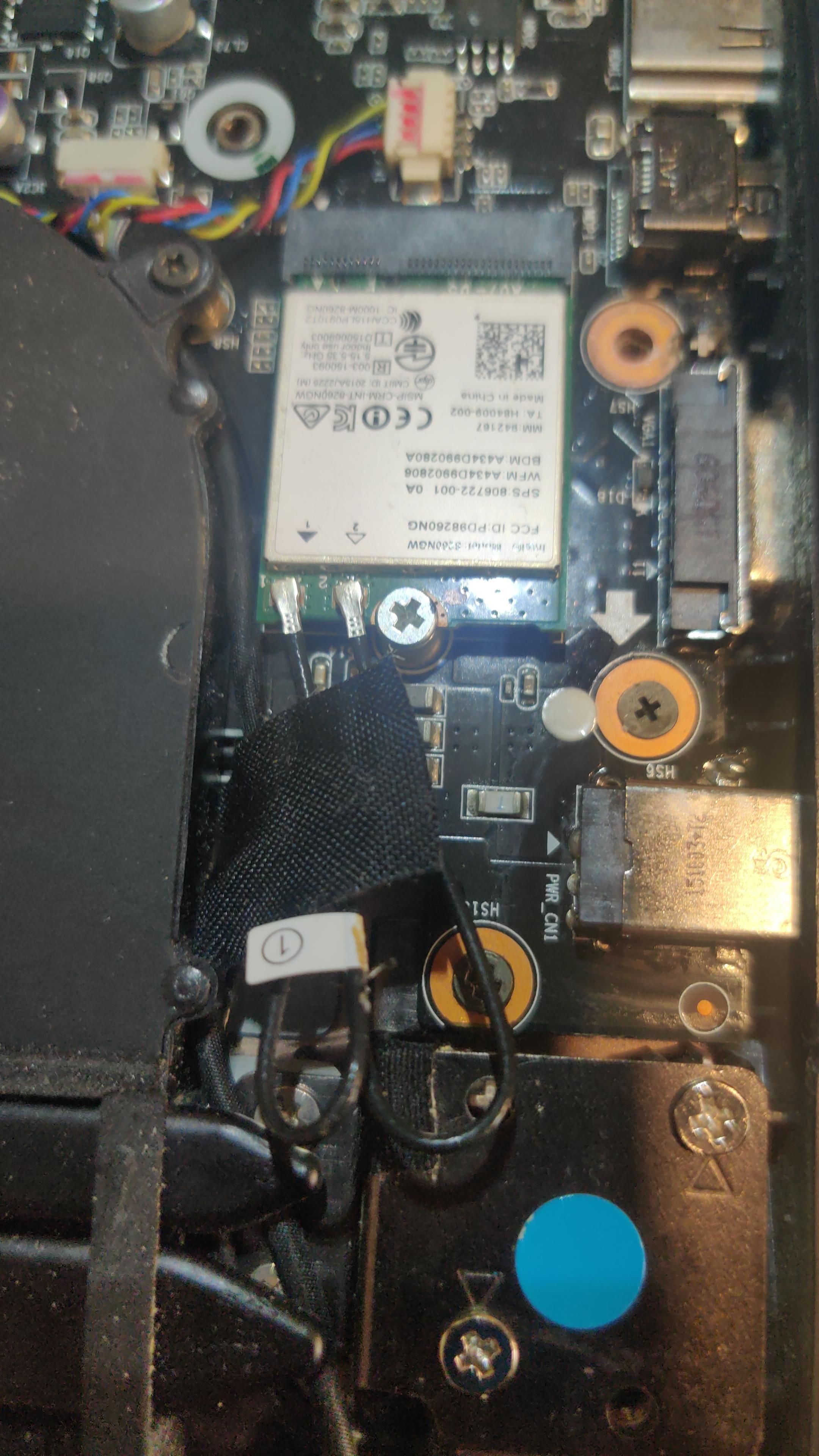 Picture of part of a laptop motherboard. The jack is marked POWER_CN1