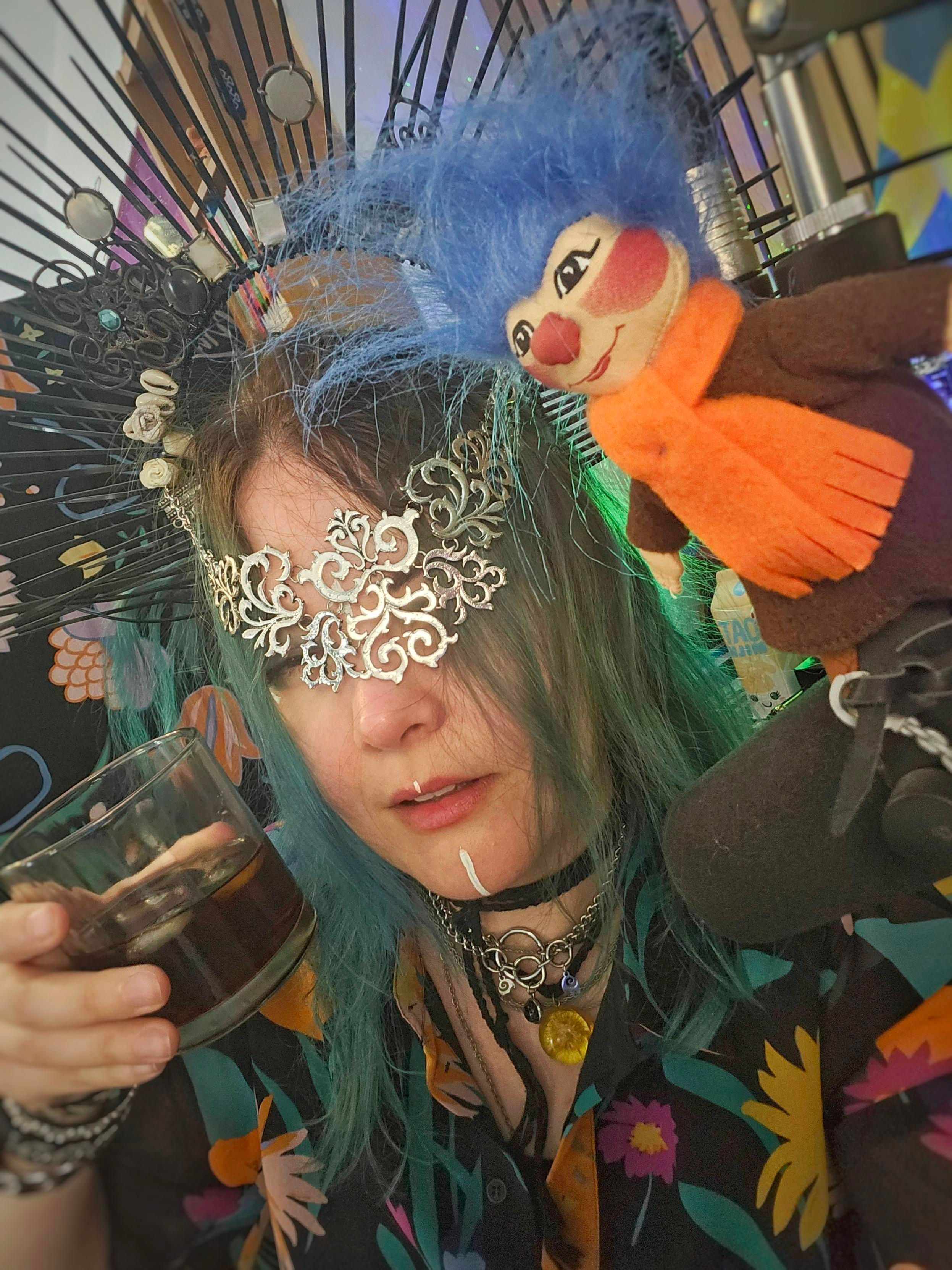 A disheveled looking Jen having a drink with plupp