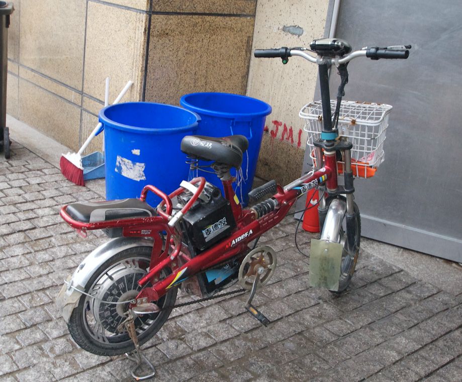 an electric bike, maybe? or something with a small motor? and a baset. looks like a small folding bike frame but i dont think it folds