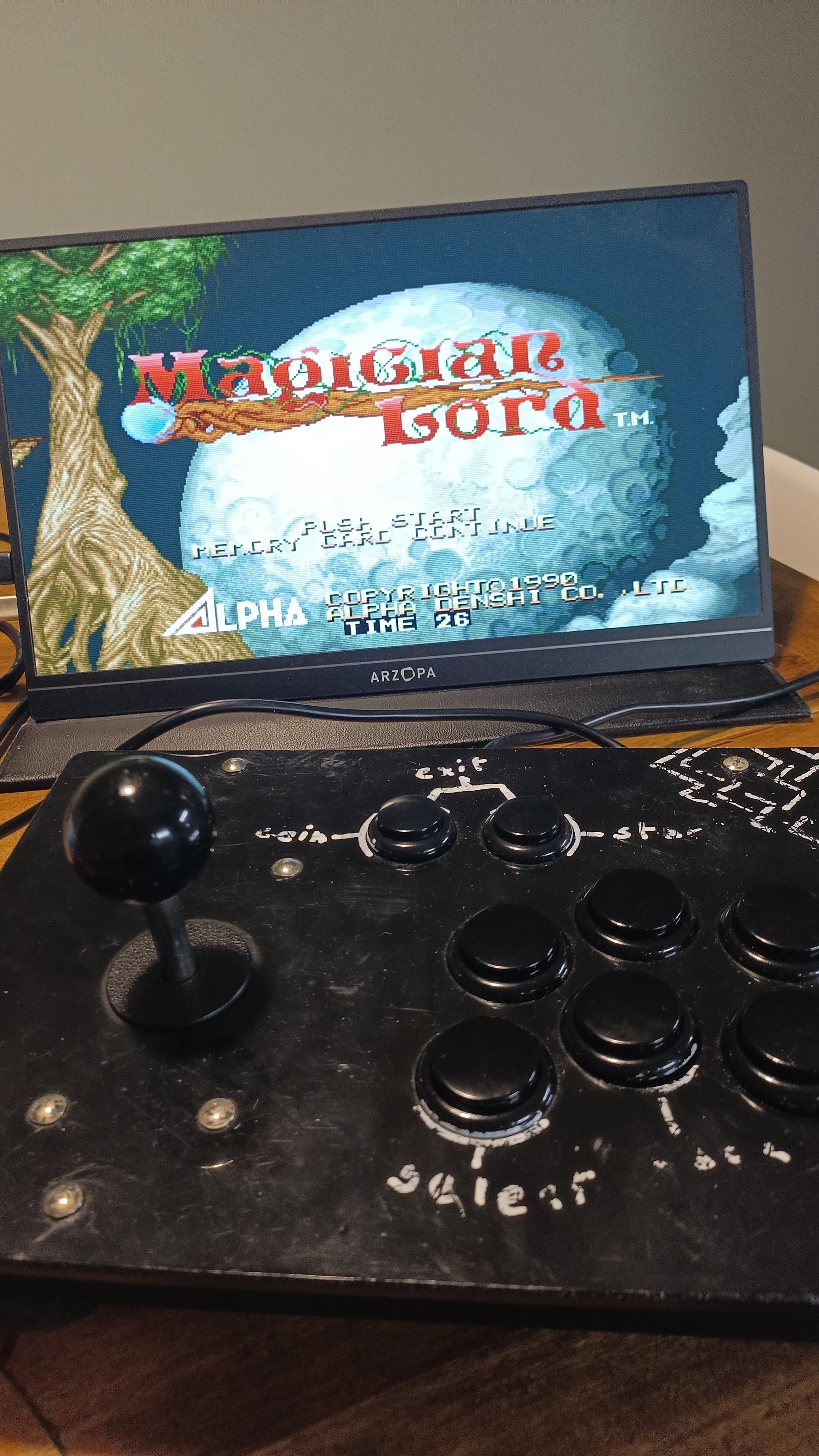 Joystick e schermo con videogame Magician Lord, neo geo.