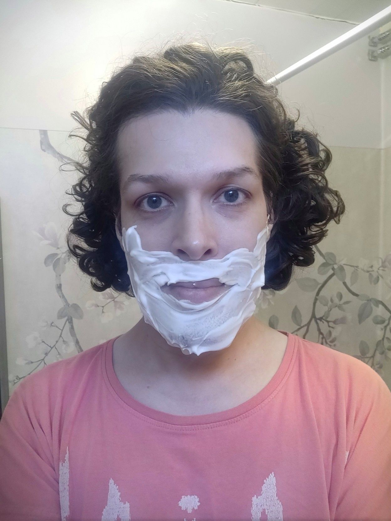 Not looking very amused, lower half of my face covered in shaving foam.