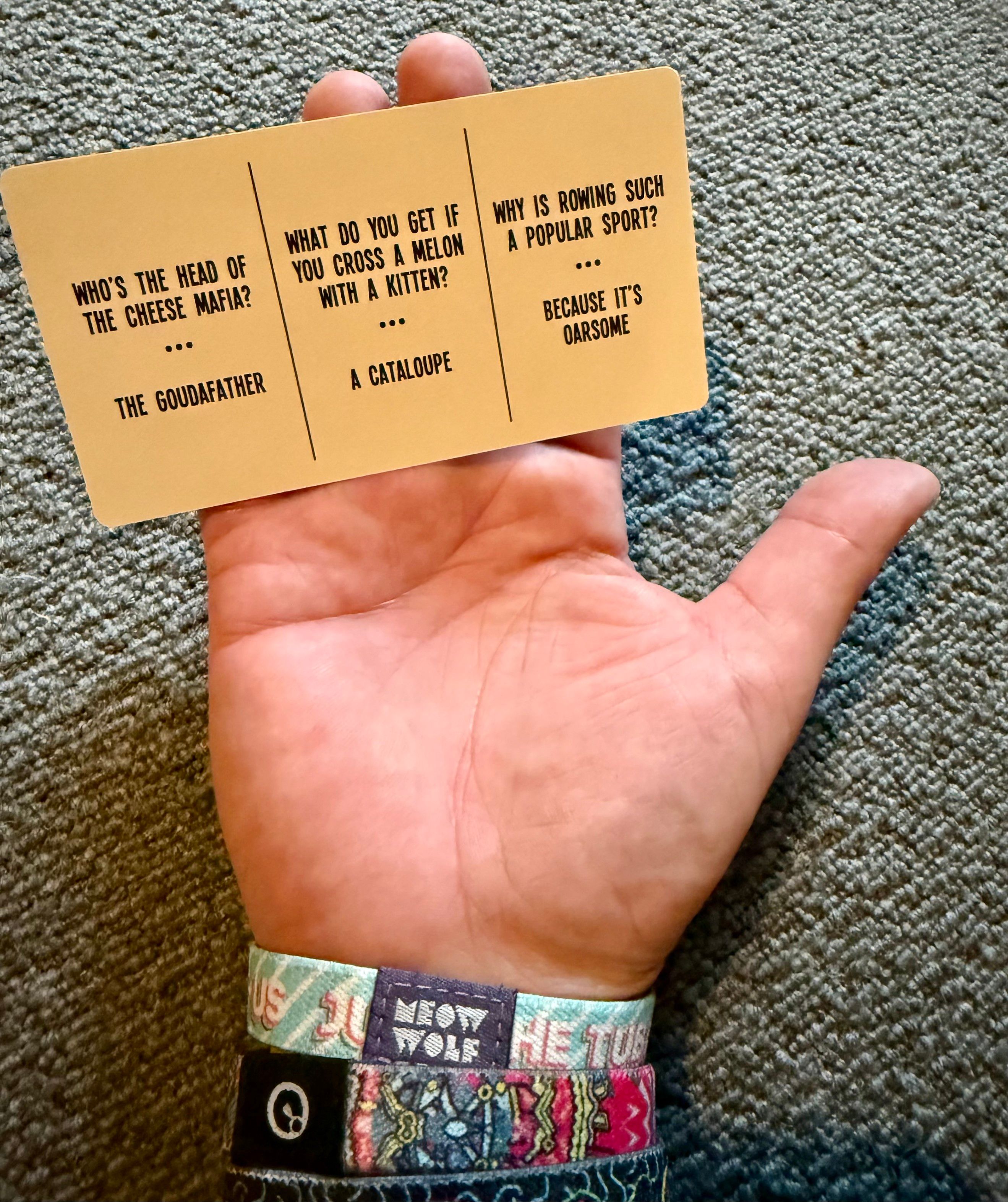 Hand holding a turned over “totally embarrassing Dad Jokes” card. Trust me, you don’t want me to tell you what is on that card. You’re welcome.