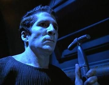 A homicidal hologram holding a hammer