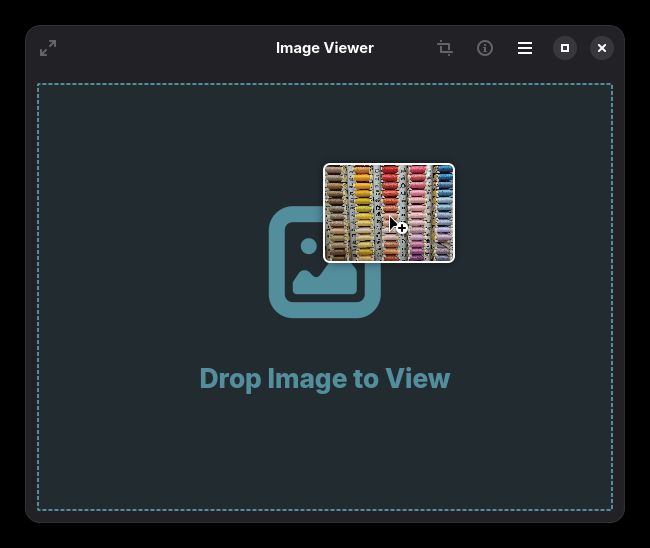 Loupe screenshot with pointer hovering an image drag-and-drop into the window.