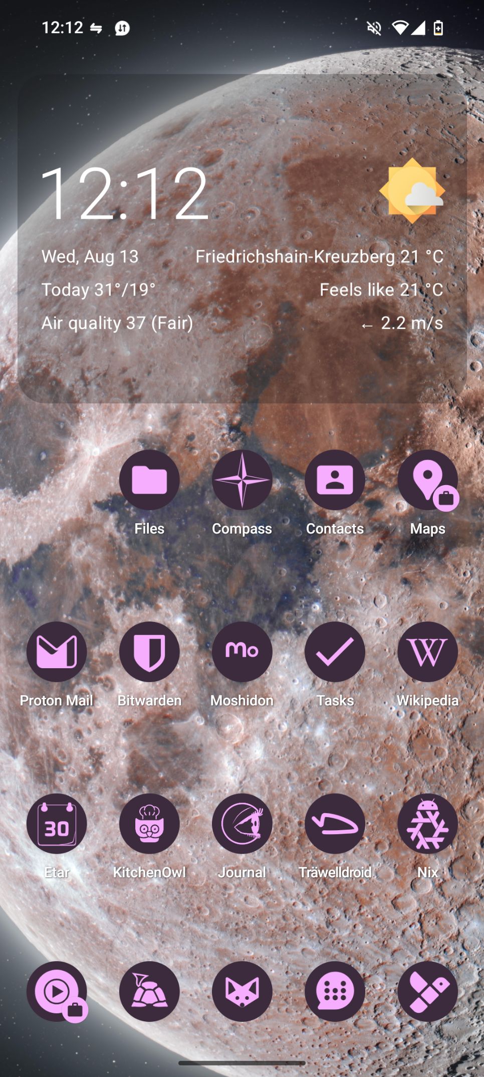 my home screen main page with weather stats and lots of quick access material you icon designs, the wallpaper is a high res shot of the moon