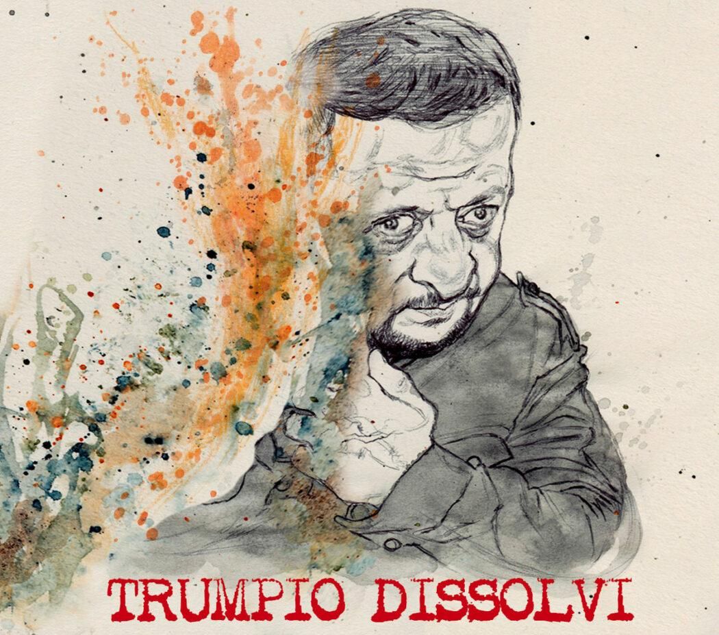 Nel disegno, il ritratto di Zelensky sparisce in una fiammata.
In basso, la scritta: "Trumpio Dissolvi".