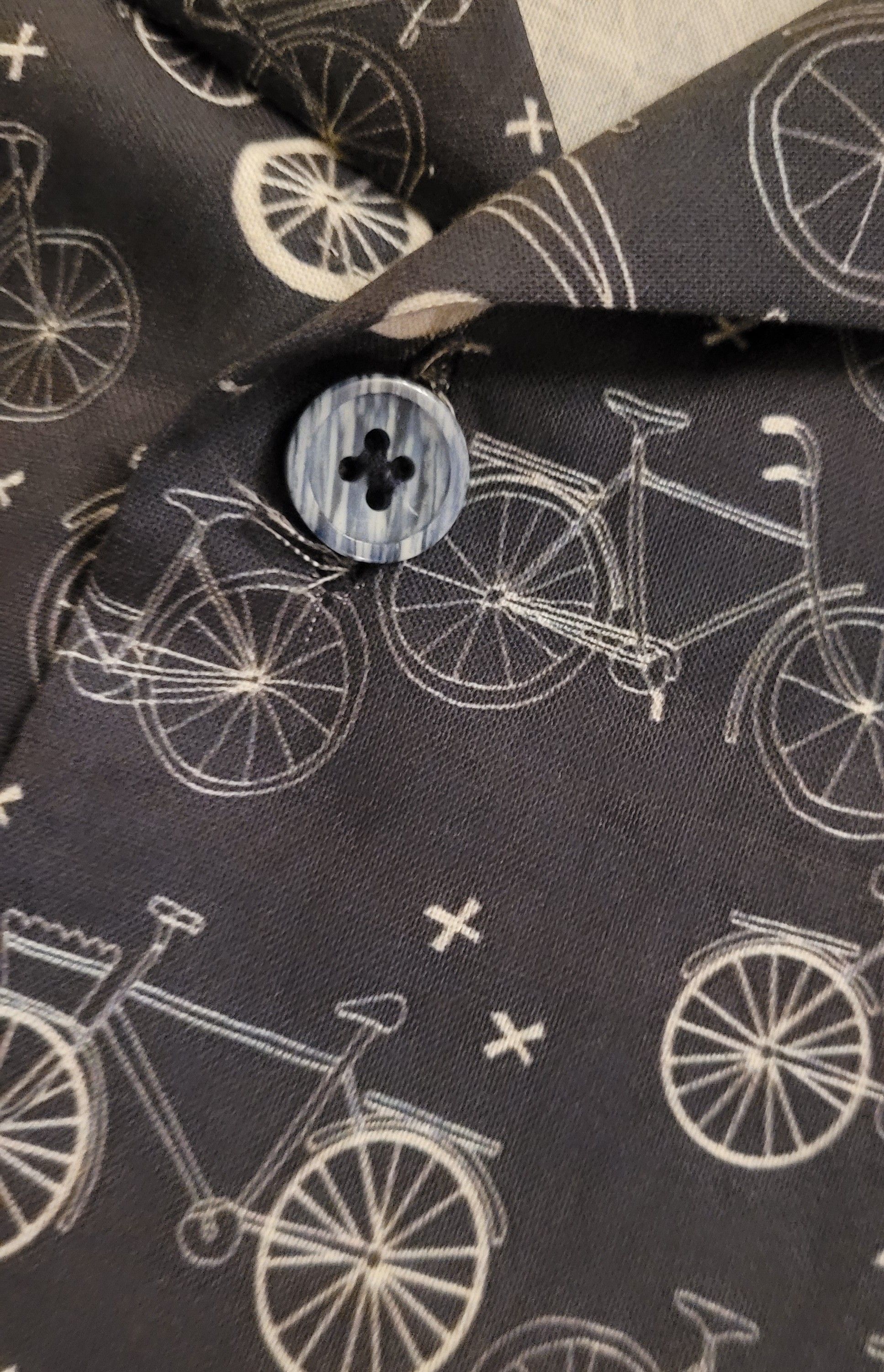 Button on bicycle shirt