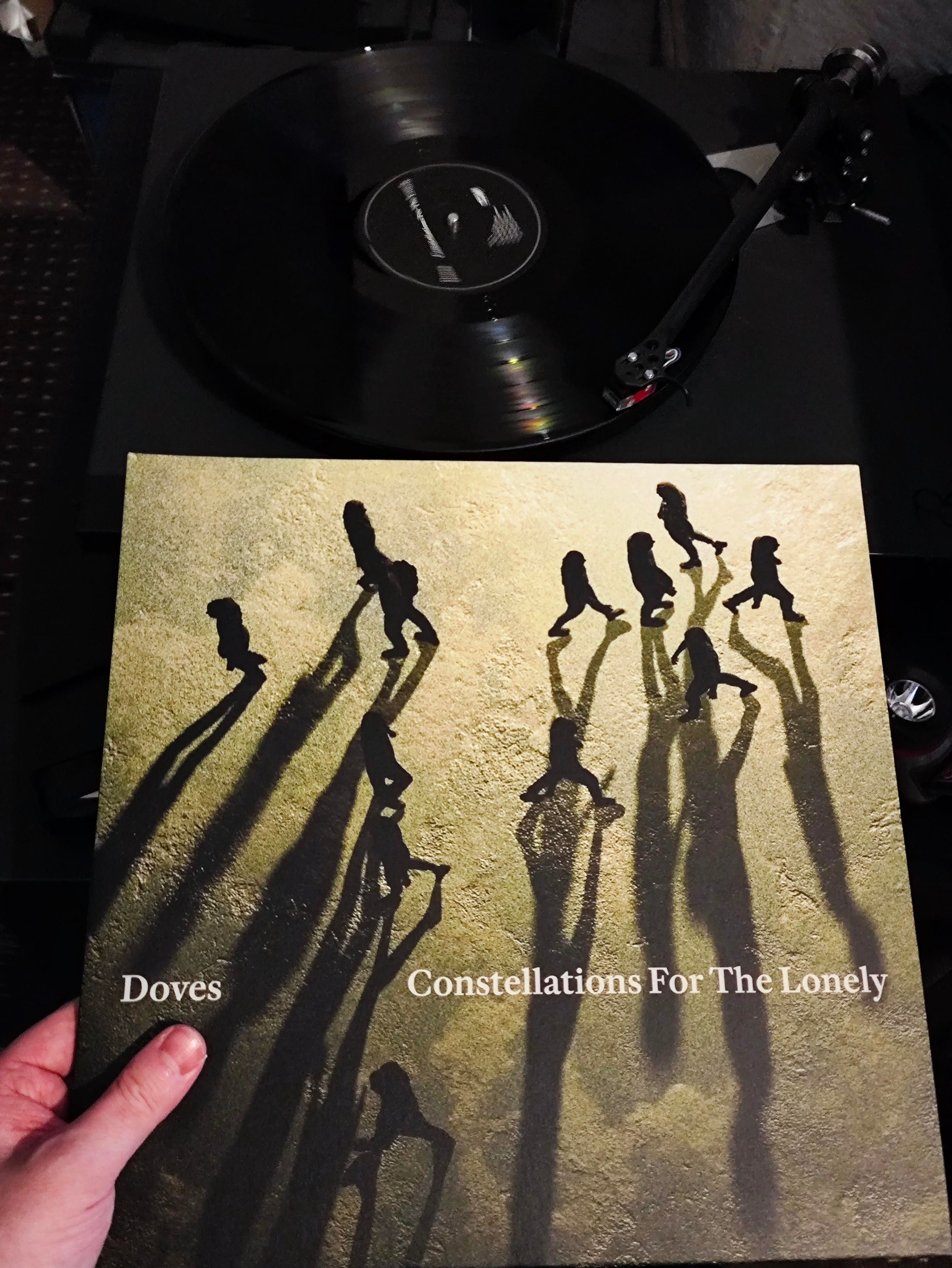 People walking from top down with shadows vinyl cover photo 