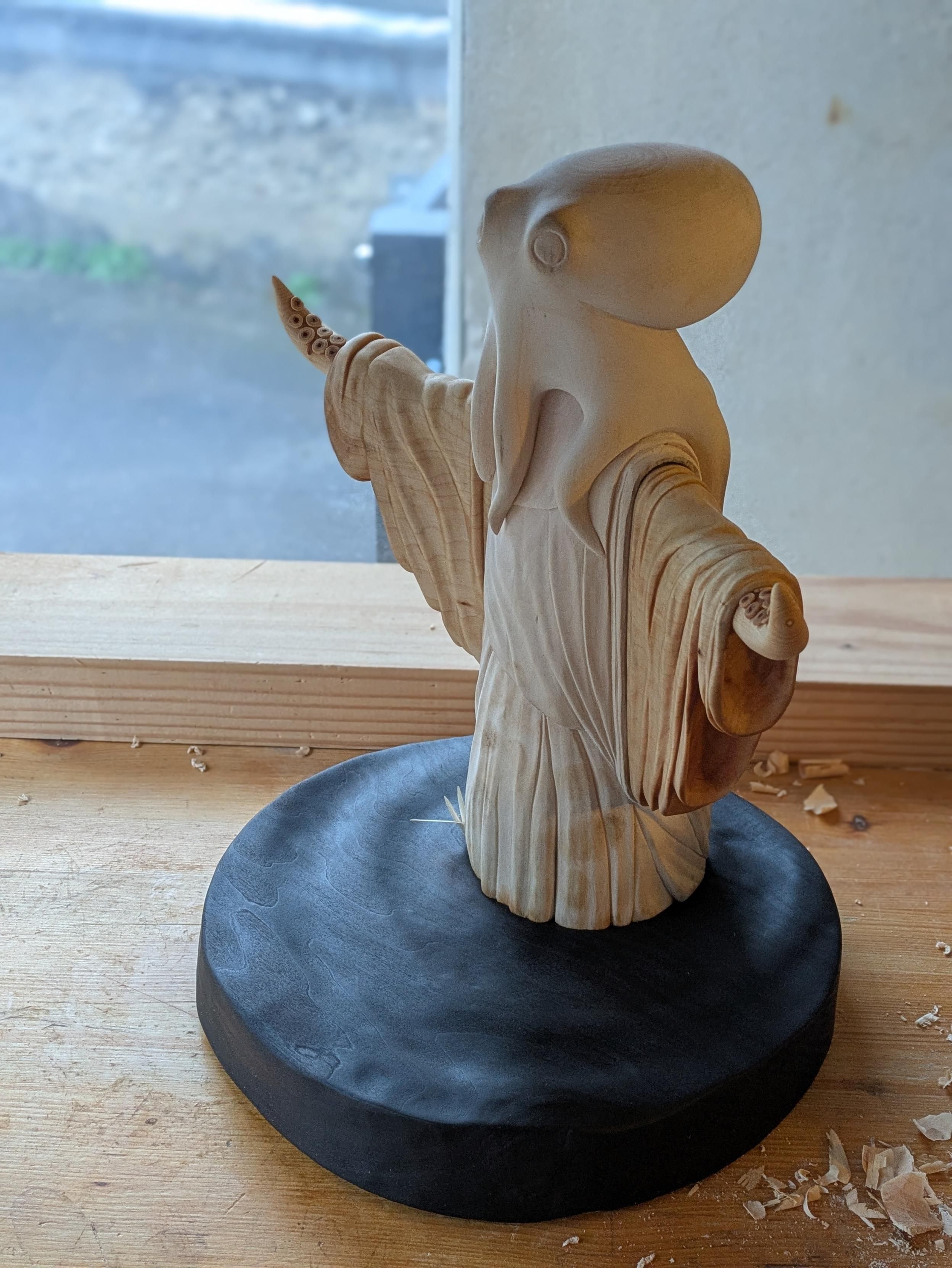 The base is now burnt, the humanoid Octopus fits on it. The wave is now smooth.