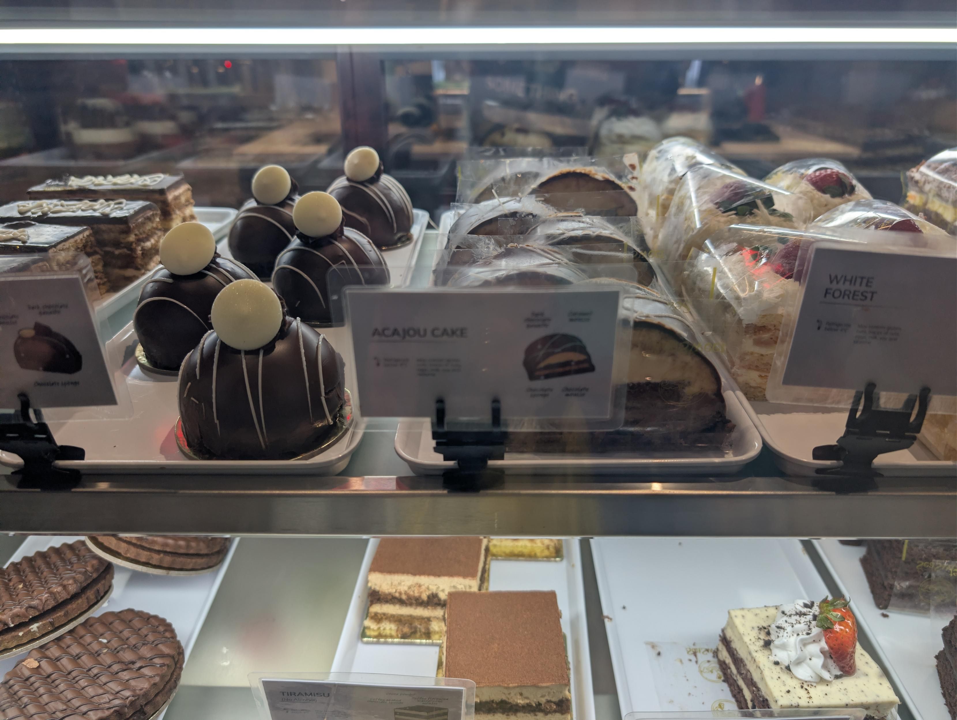 Acajou Cake, a chocolate sponge cake with caramel and chocolate mousse. On display