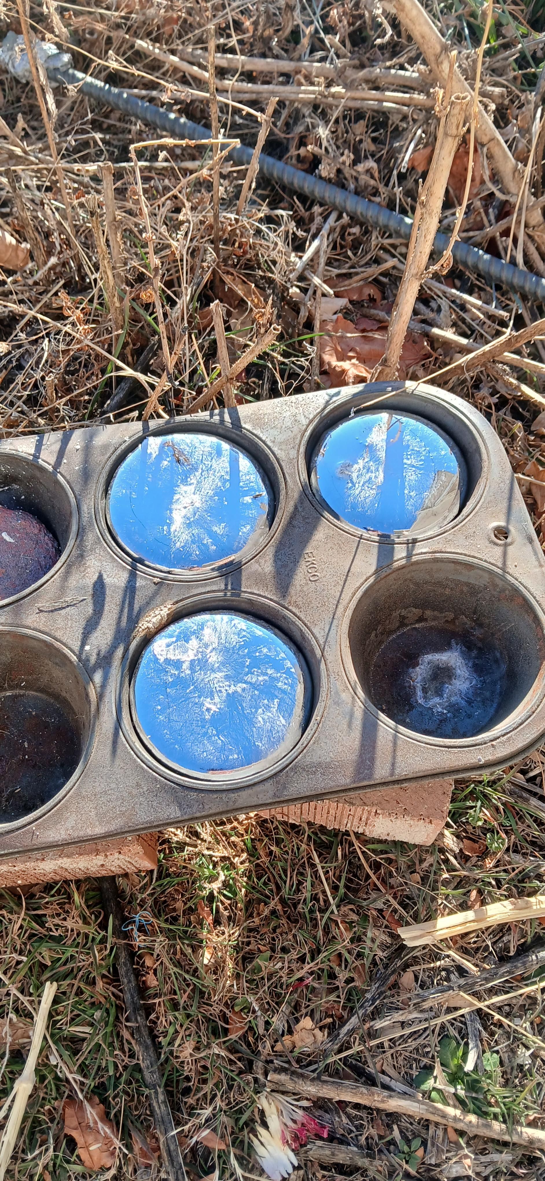 Aluminum reflecting the sky and clouds 