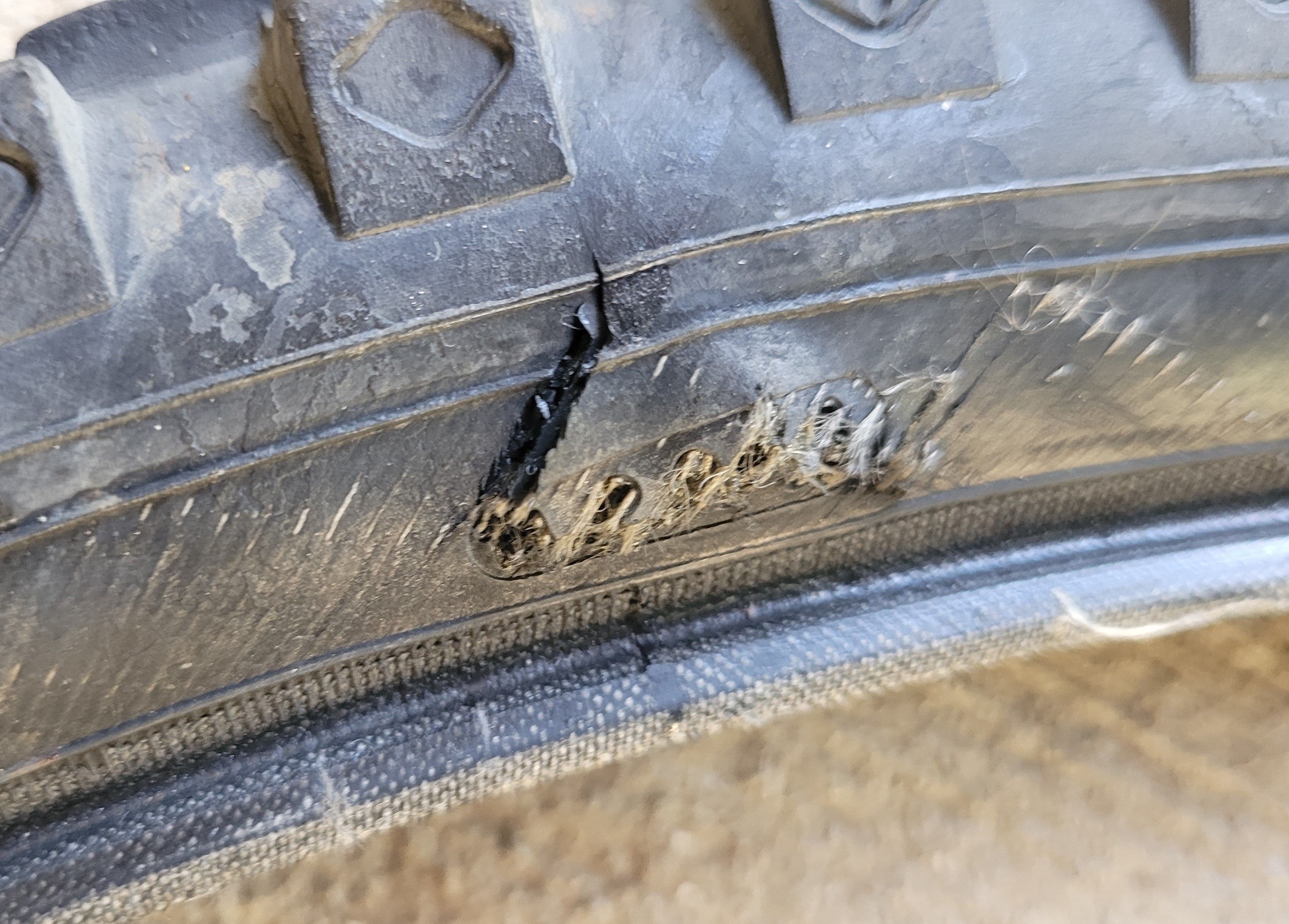 Tire with a big tear in it