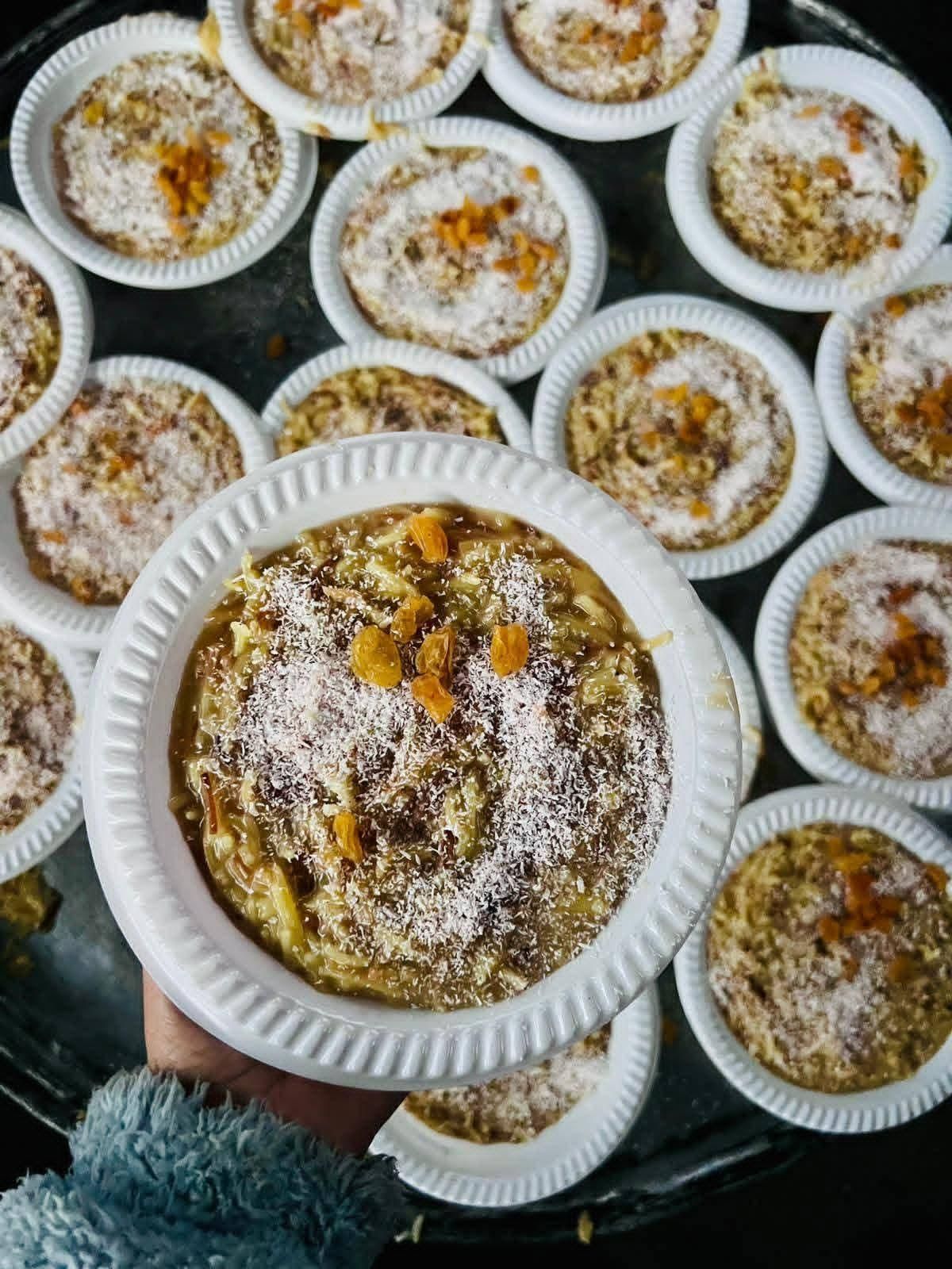 I made a delicious, nutritious, and warming winter treat: caramelized rice pudding for the camp children.
