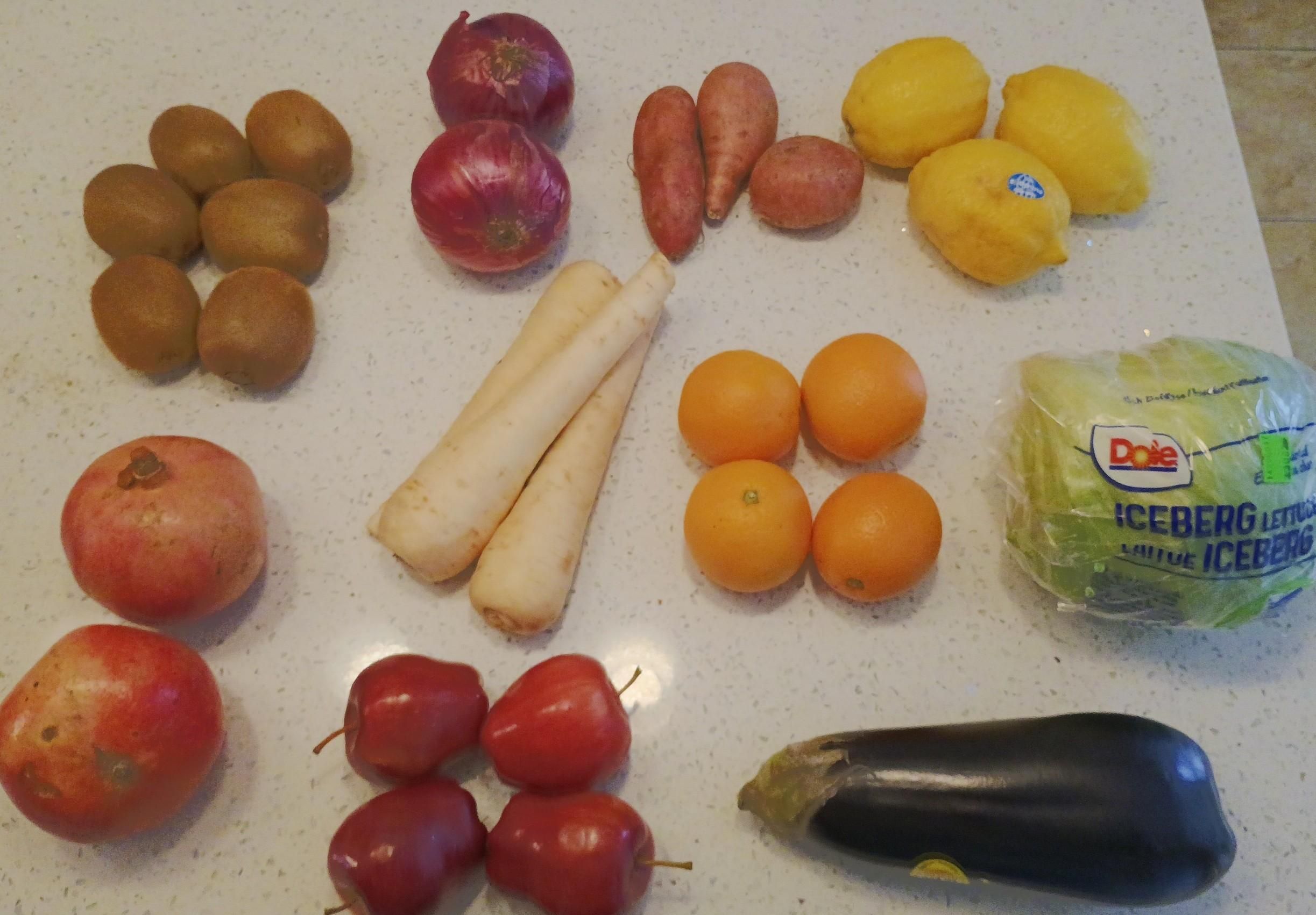 This week I've got kiwis,  red onion, sweet potatoes, pomegranate, some, parsnips, oranges, eggplant, lettuce and lemons.