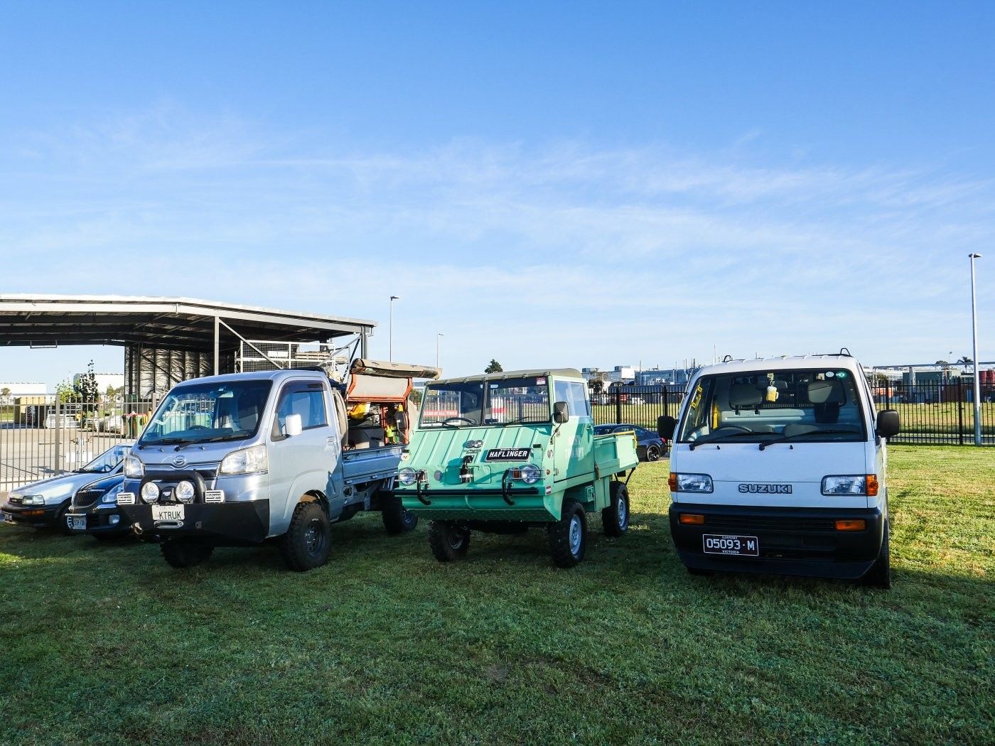 A Daihatsu Hijet, a Steyr Puch Haflinger and a Suzuki Carry lined up 