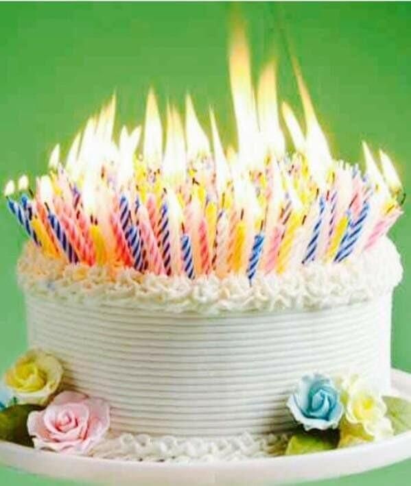 Birthday cake with too many candles. 