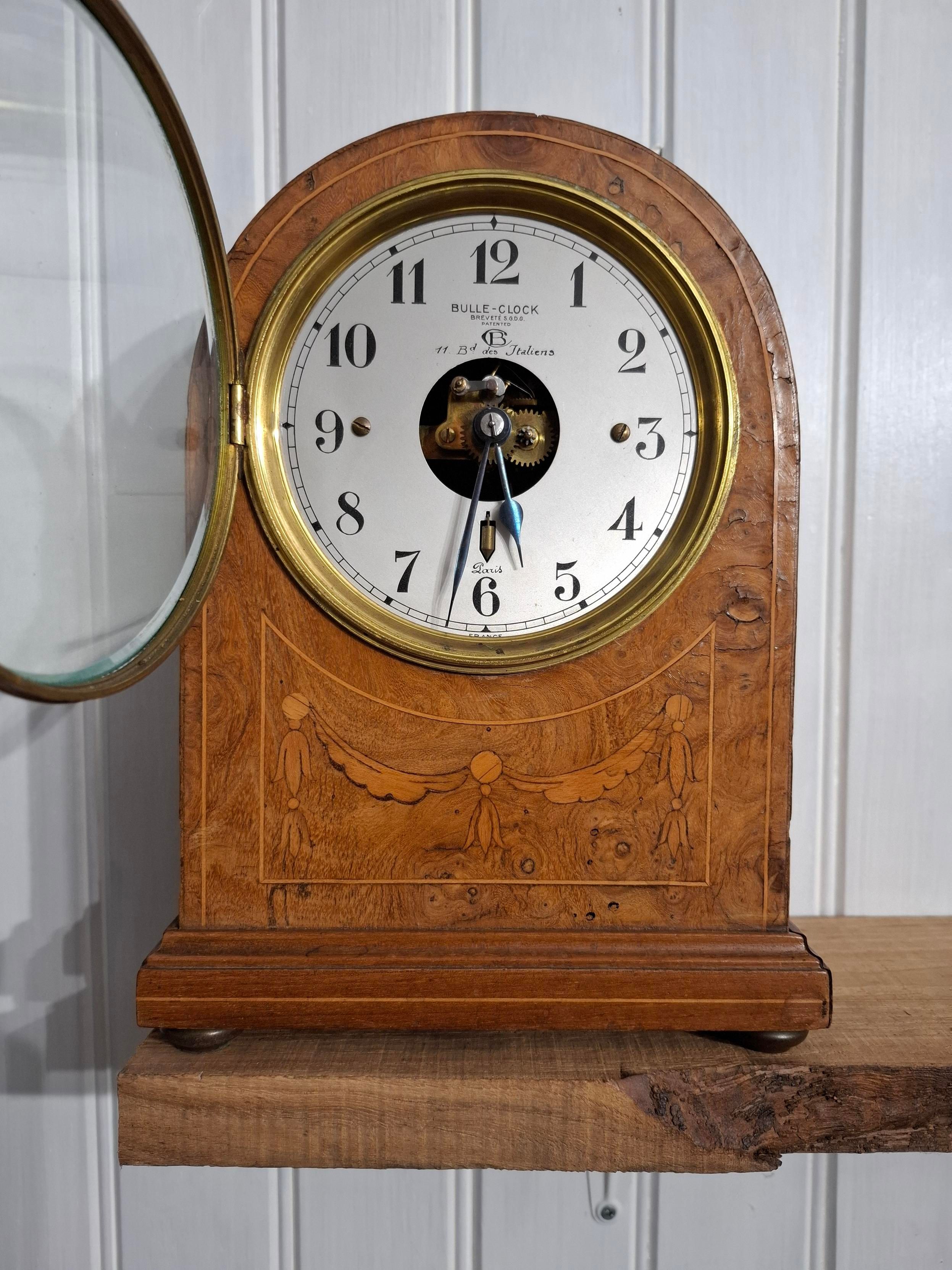 Pendule bulle clock en placage de bois précieux