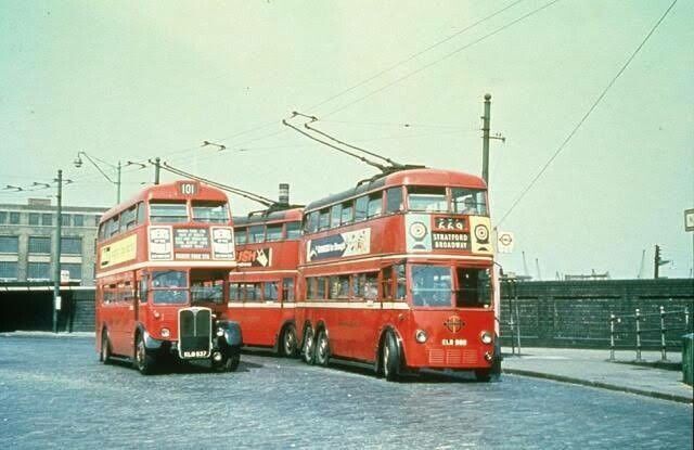 3 London Passenger Transport Board “double-decker” trolleybuses outside a depot