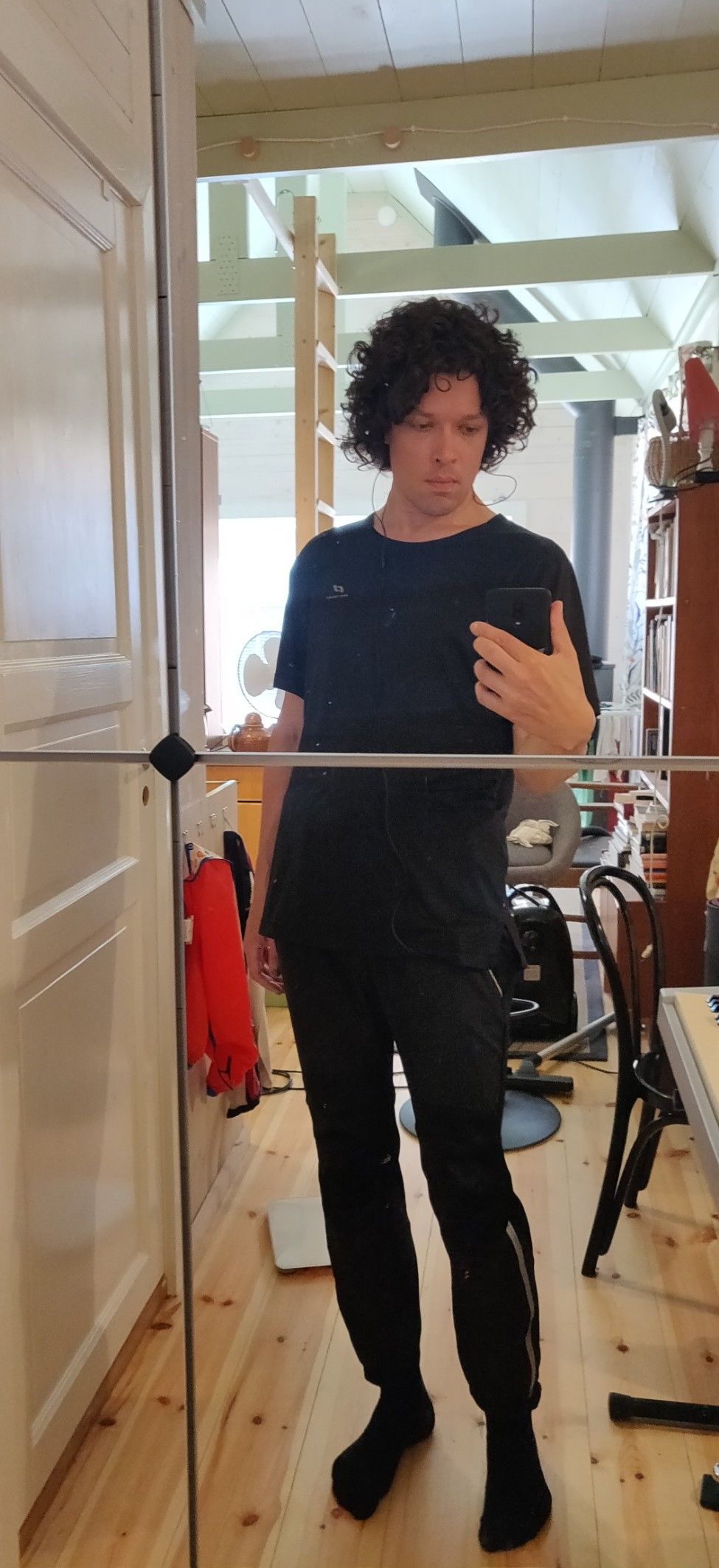 Me, very thin, in black running clothes.