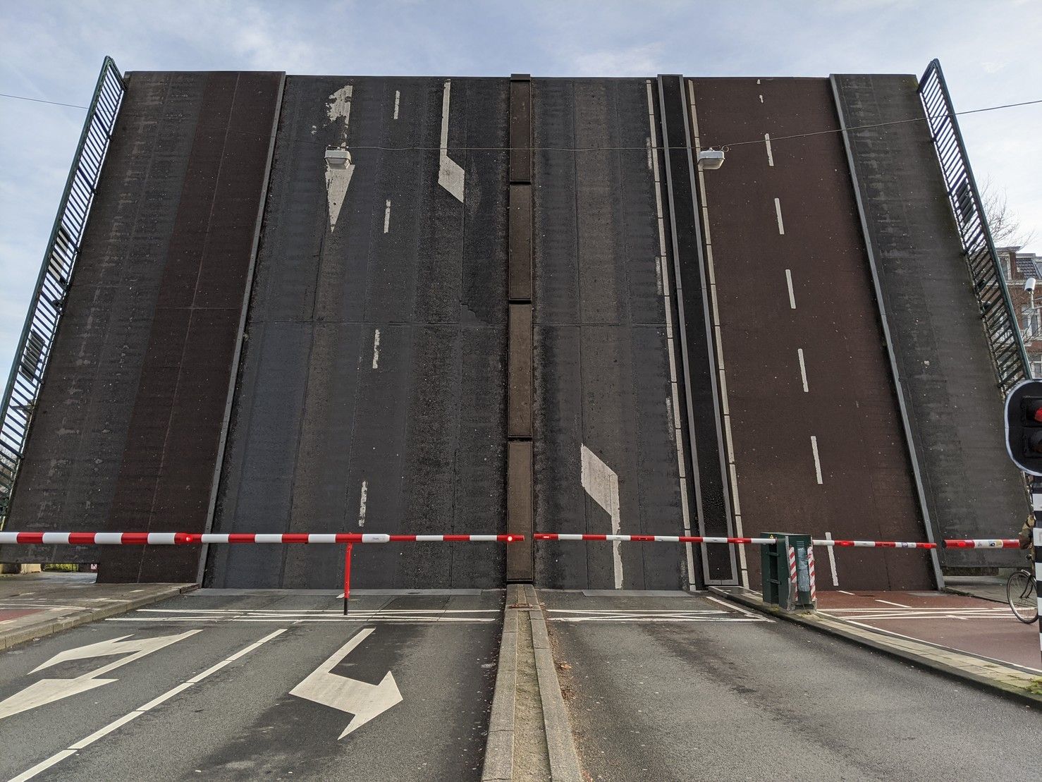 A vertical drawbridge blocking the bike path