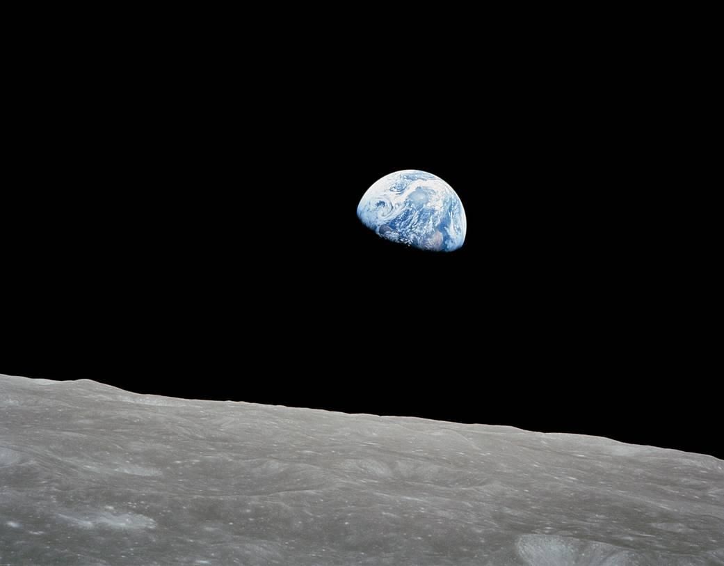 "Earthrise" - a blue earth rising above the grey landscape of the moon - captured on Dec. 24, 1968, by Apollo 8 astronaut Bill Anders, from the Apollo 8 spacecraft.

