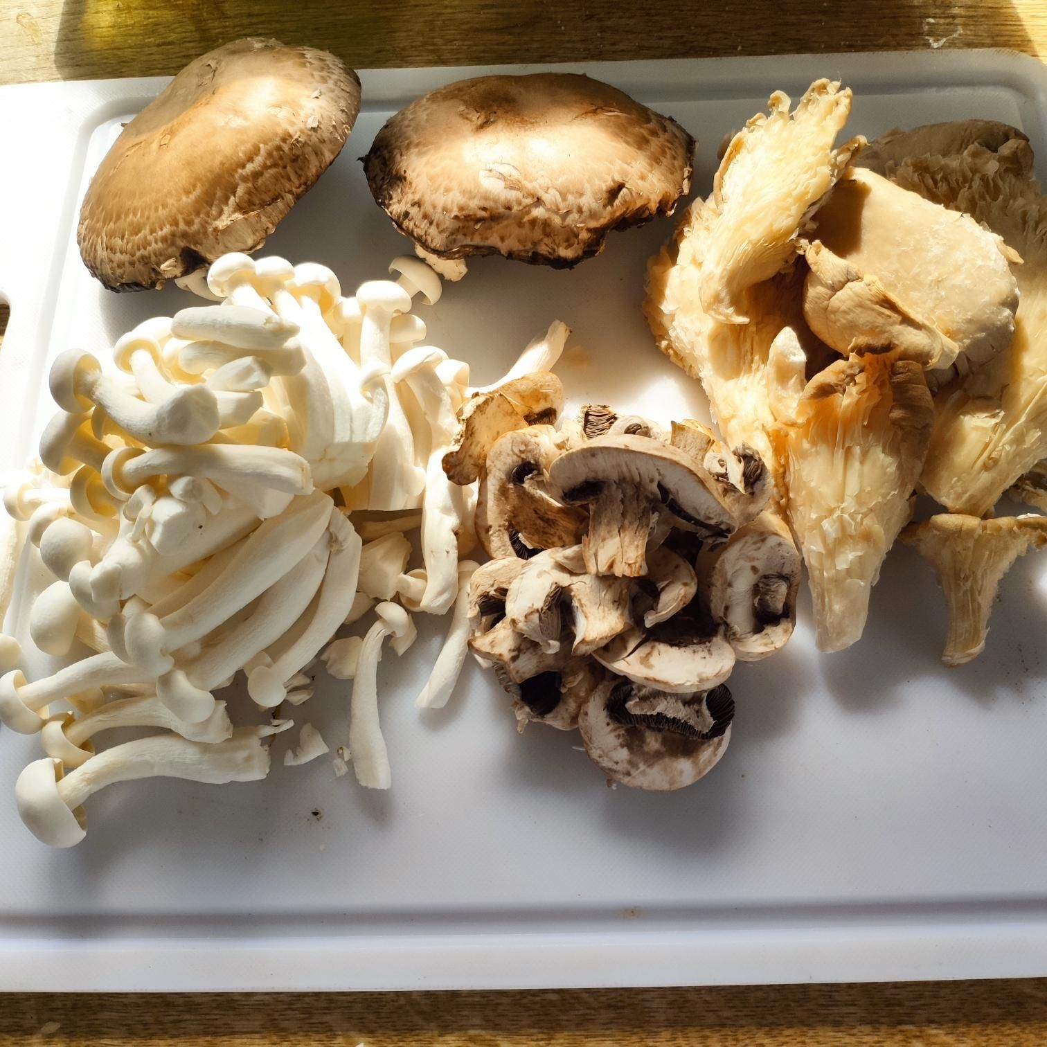 A platter of raw mushrooms