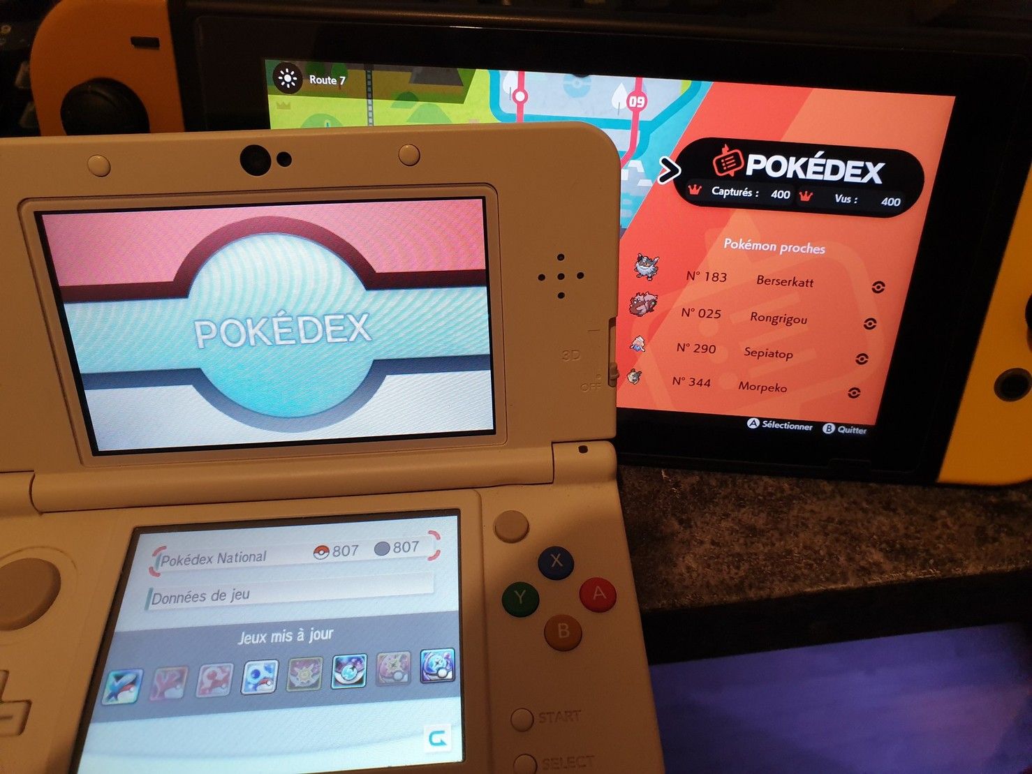 Picture showing both the PokéBank Dex and the SwSh Dex complete