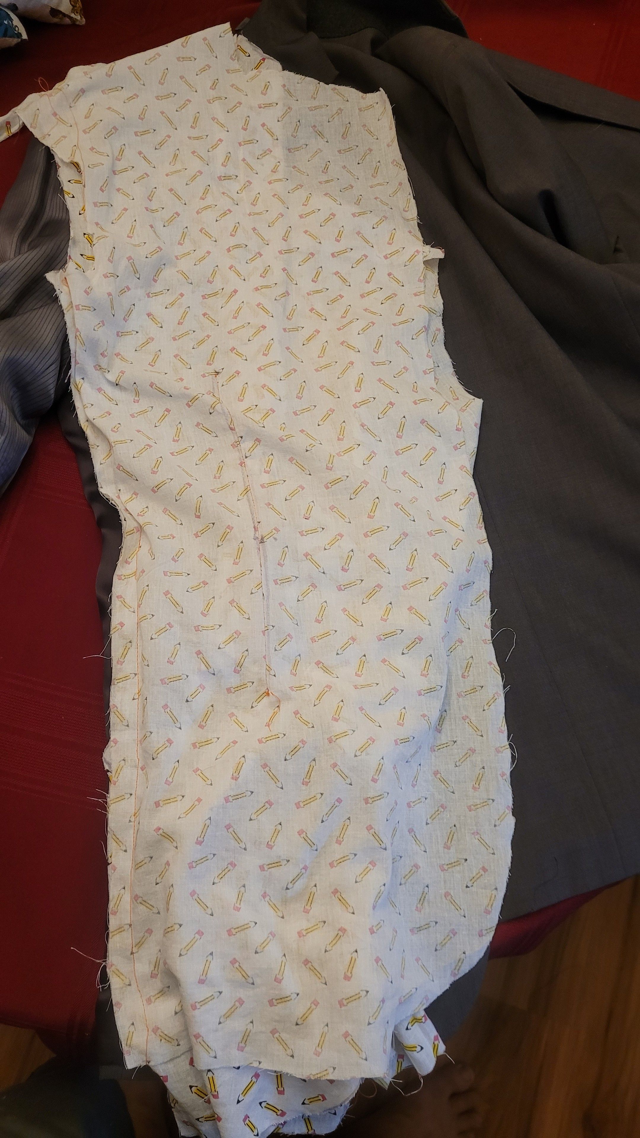 Front laid upon jacket that fits, matches size