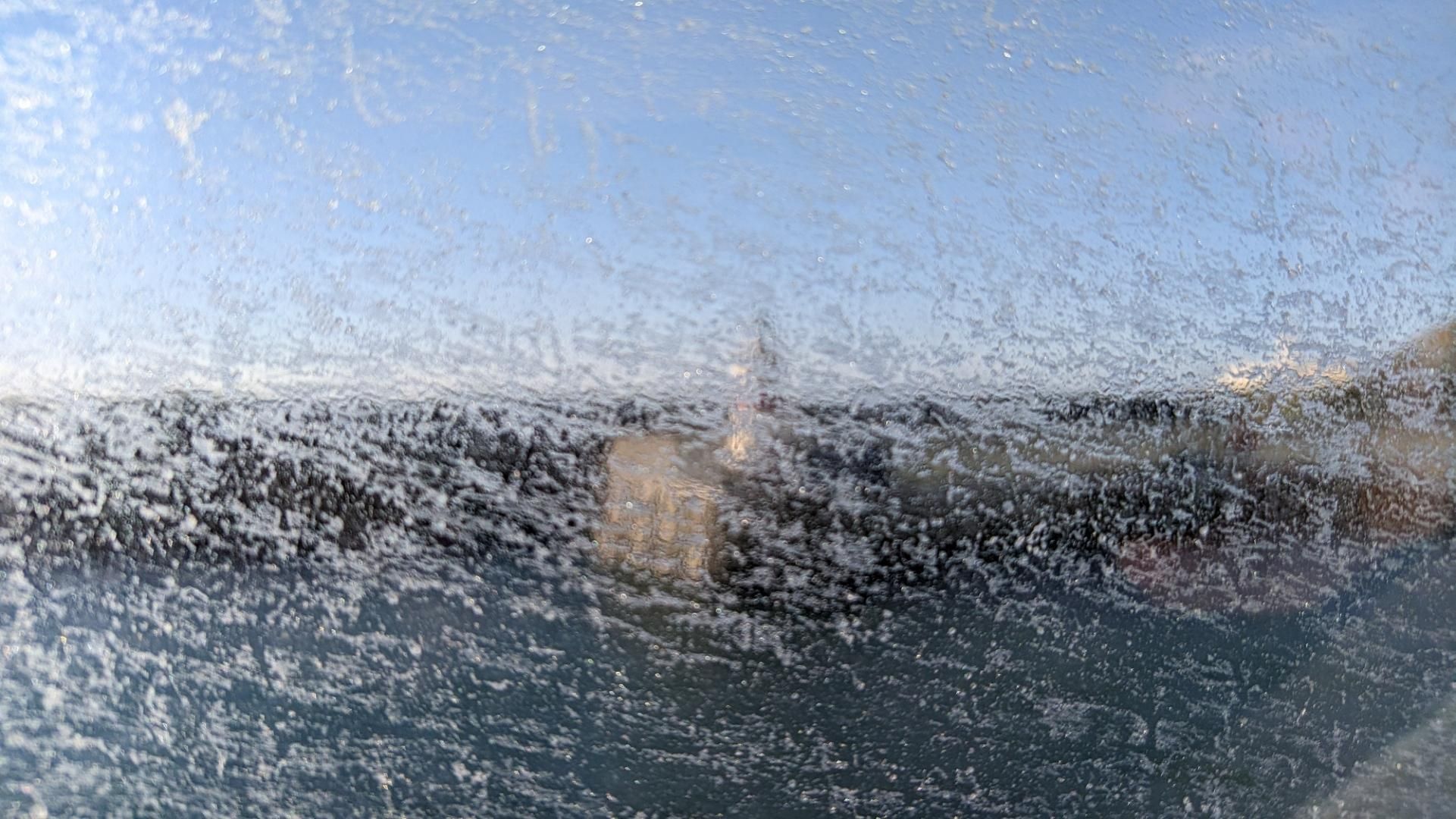Light house through the salty windoe