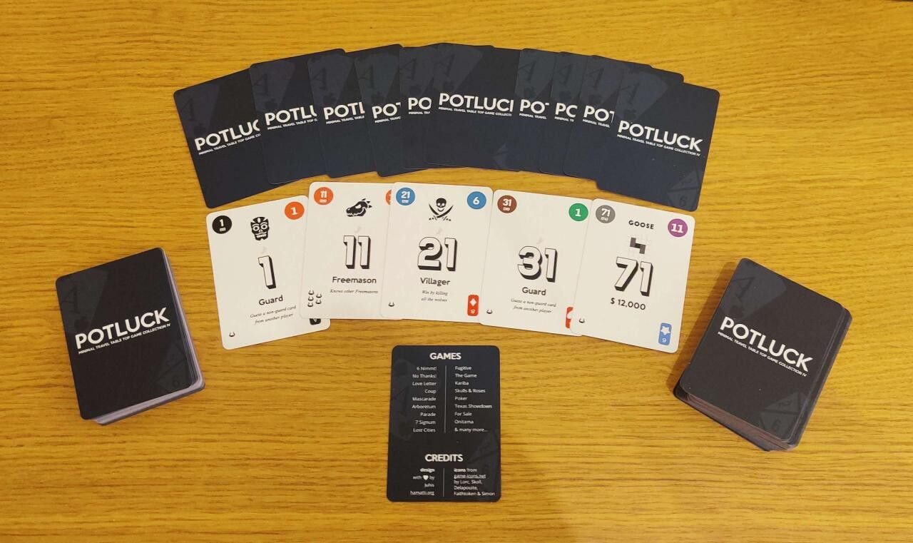 A deck with a few cards fanned out face-down, showing a dark blue background with white logo saying Potluck. Below them, five white cards face up showing numbers 1, 11, 21, 31 and 71 and a variety of other elements in the cards.

Below them, a single card listing a bunch of games and credits for the project.