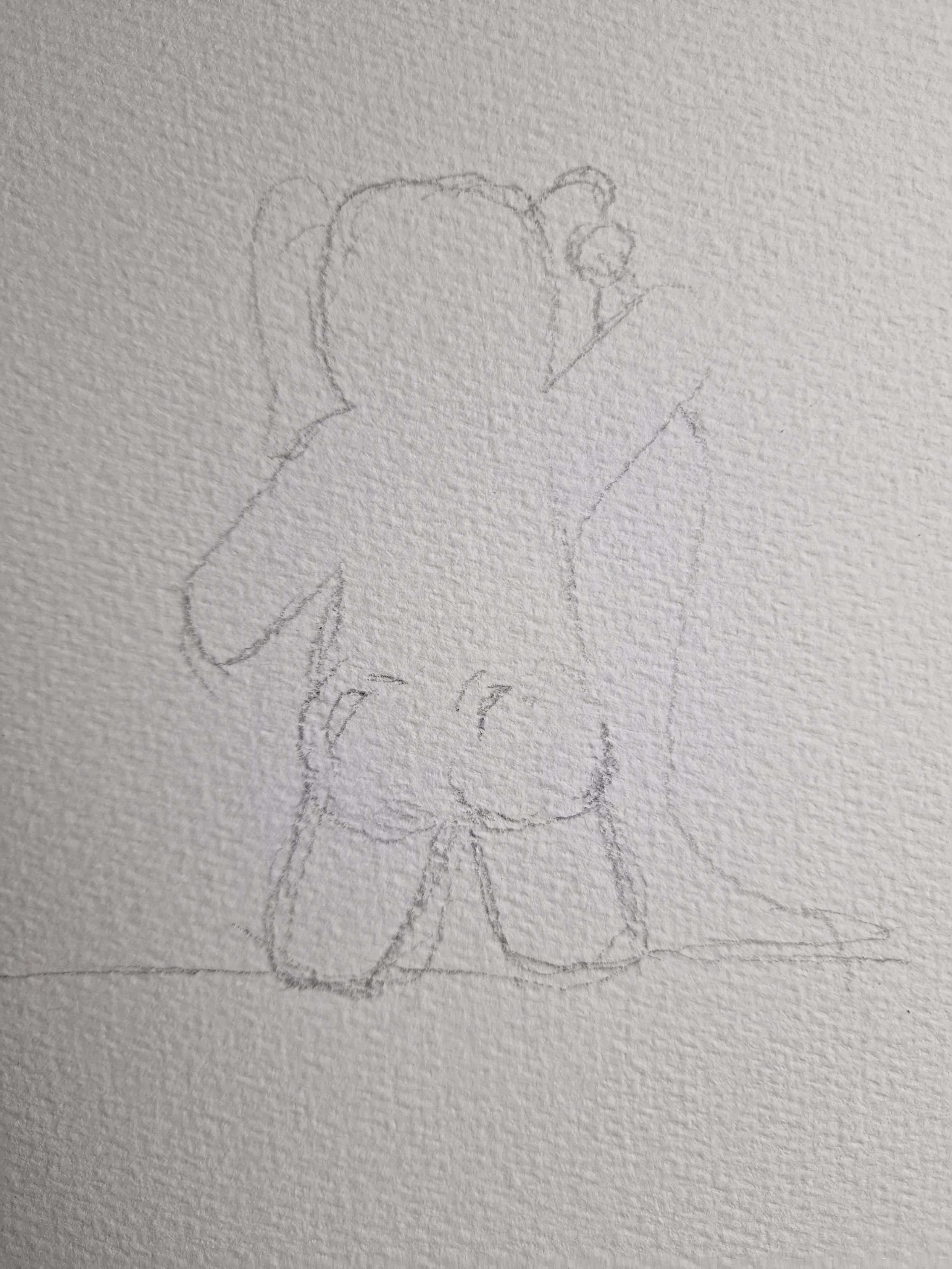 From behind. The elephant is standing in a triumphant pose holding up a mic. His ass cheeks a-gleaming