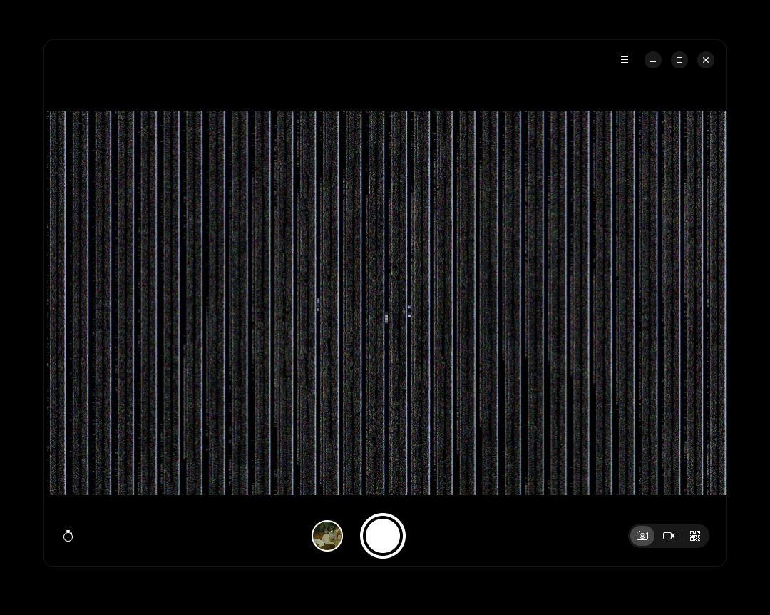 screenshot of Snapshot, showing the camera feed - the image is glitches, showing rows of white bars followed by colourful fuzz