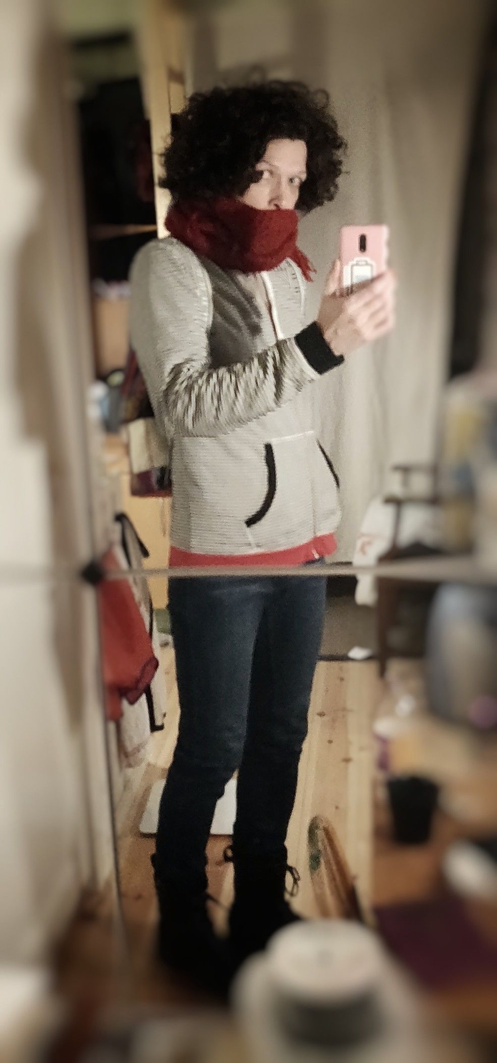 me in mirror, with a red scarf, striped hoodie and blue tight jeans