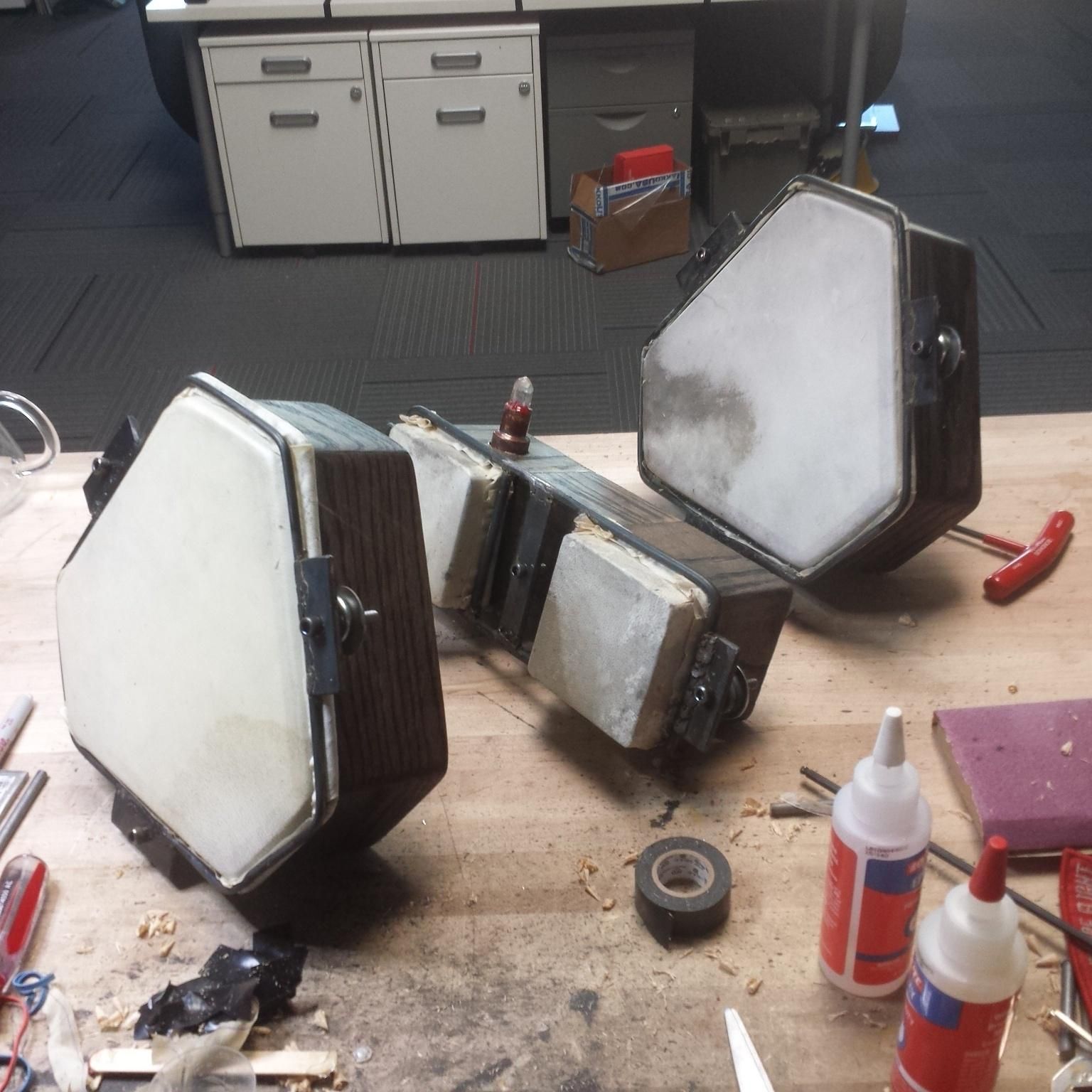 Another set of drumskin speakers. This time a small boombox and two hexagonal accessory speakers.