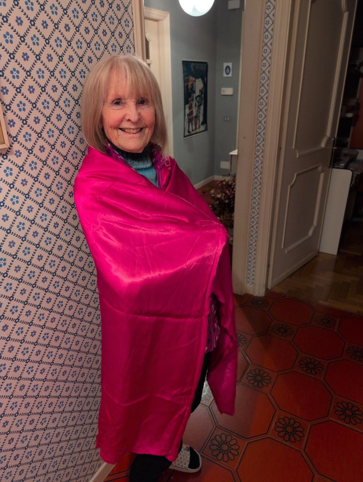 Nonna D wearing the cloth before cutting