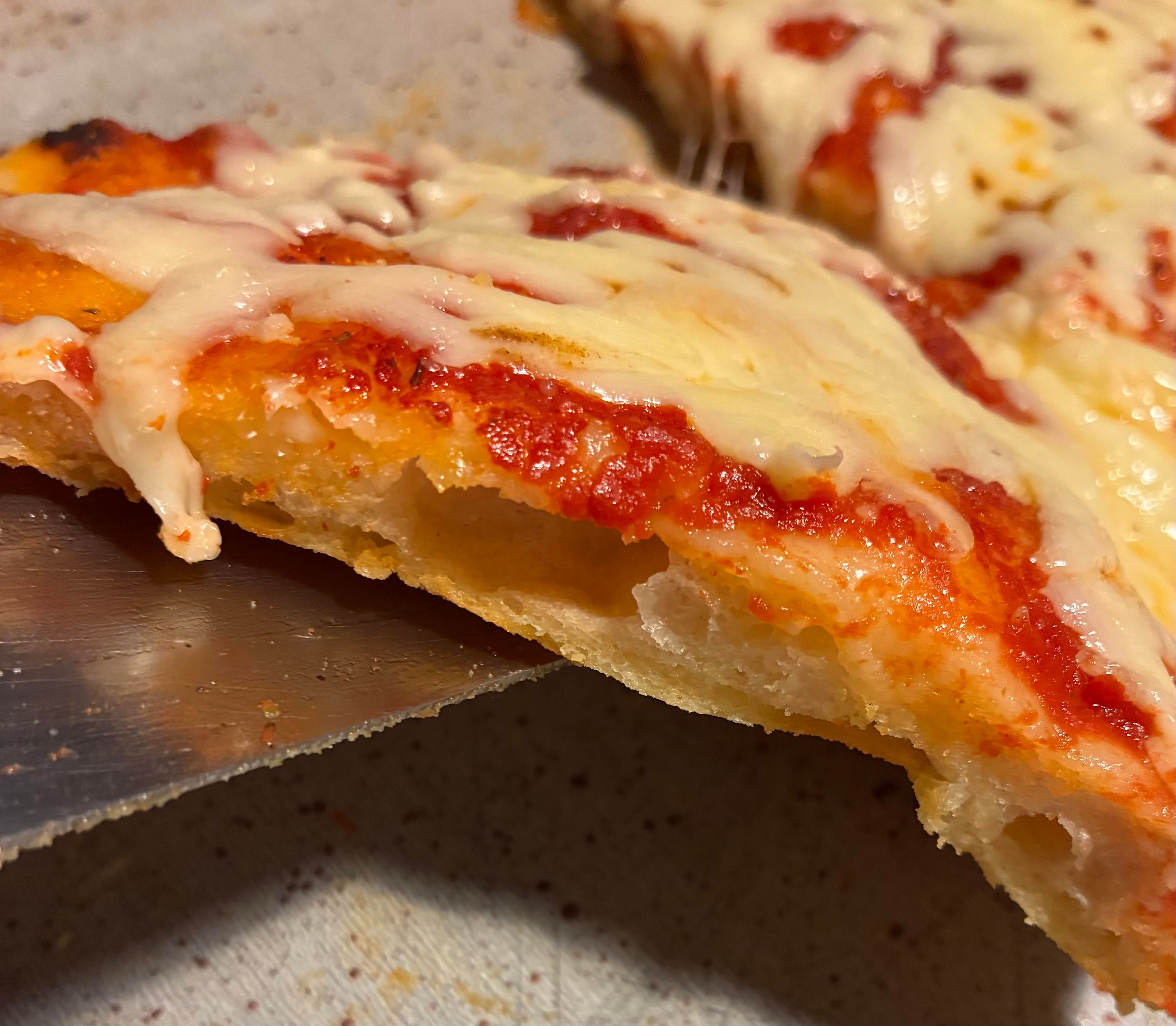 Fetta di pizza fatta in casa