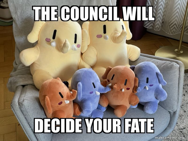 The same image of two large Mastodon stuffed toys in beige color, and 4 little Mastodon stuffed toys, two apricot colored, and two blue. Traditional meme-style text (large, white, all caps, impact font) has been added to the image. On the top, it says "the council will" and on the bottom it says "decide your fate". A watermark from "makeameme.org" has also been added.