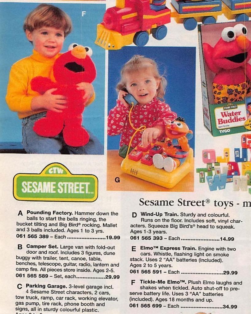 Inset of Page 490 of the 1996 Sears Wishbook from Canada. Children play with various Sesame Street-themed toys, notably the Tickle Me Elmo doll. Text for the doll reads: F. Tickle Me Elmo™. Plush Elmo laughs and shakes when tickled. Auto shut-off to preserve battery life. Uses 3 "AA" batteries (included). Ages 18 months and up. 061 565 699 - Each…34.99. Prices listed in Canadian dollars.