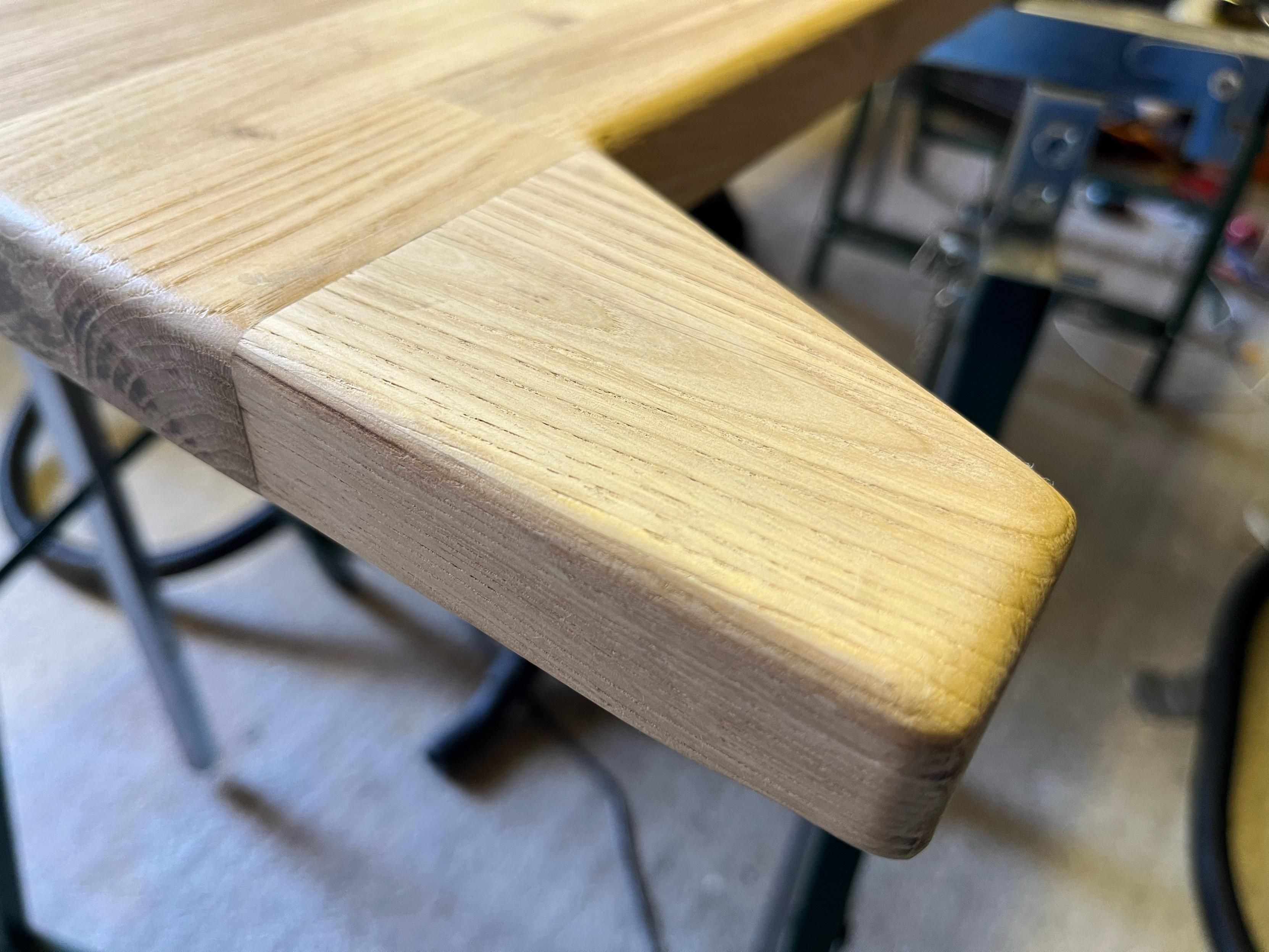 Jointed piece onto back of worktop. 