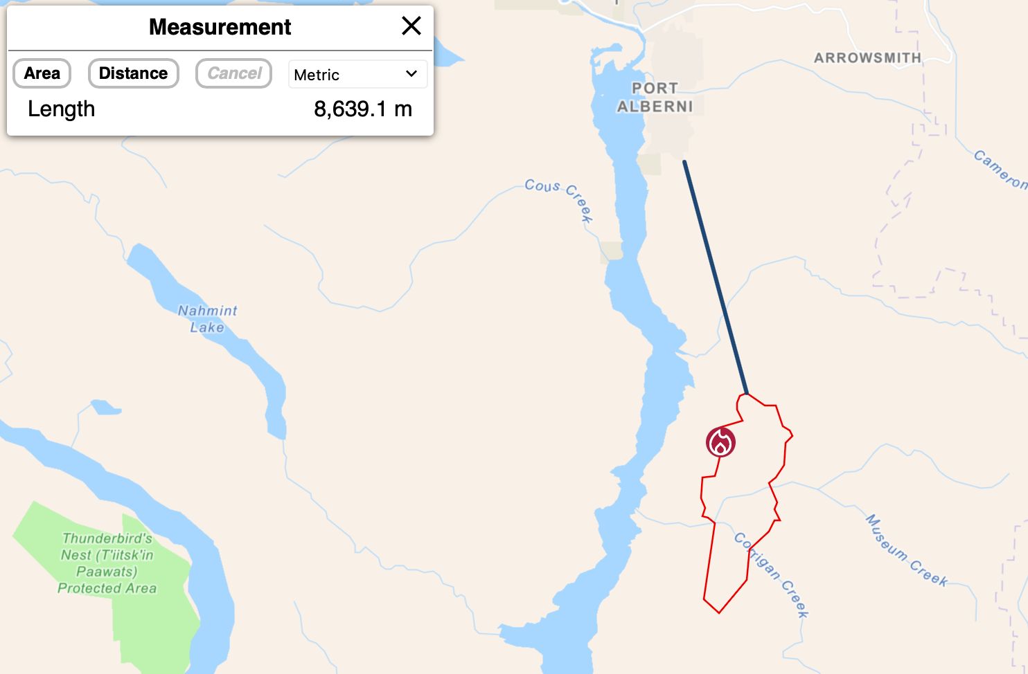 A screenshot of the BC Wildfire map shows a straight black line from the edge of Port Alberni to the fire perimeter