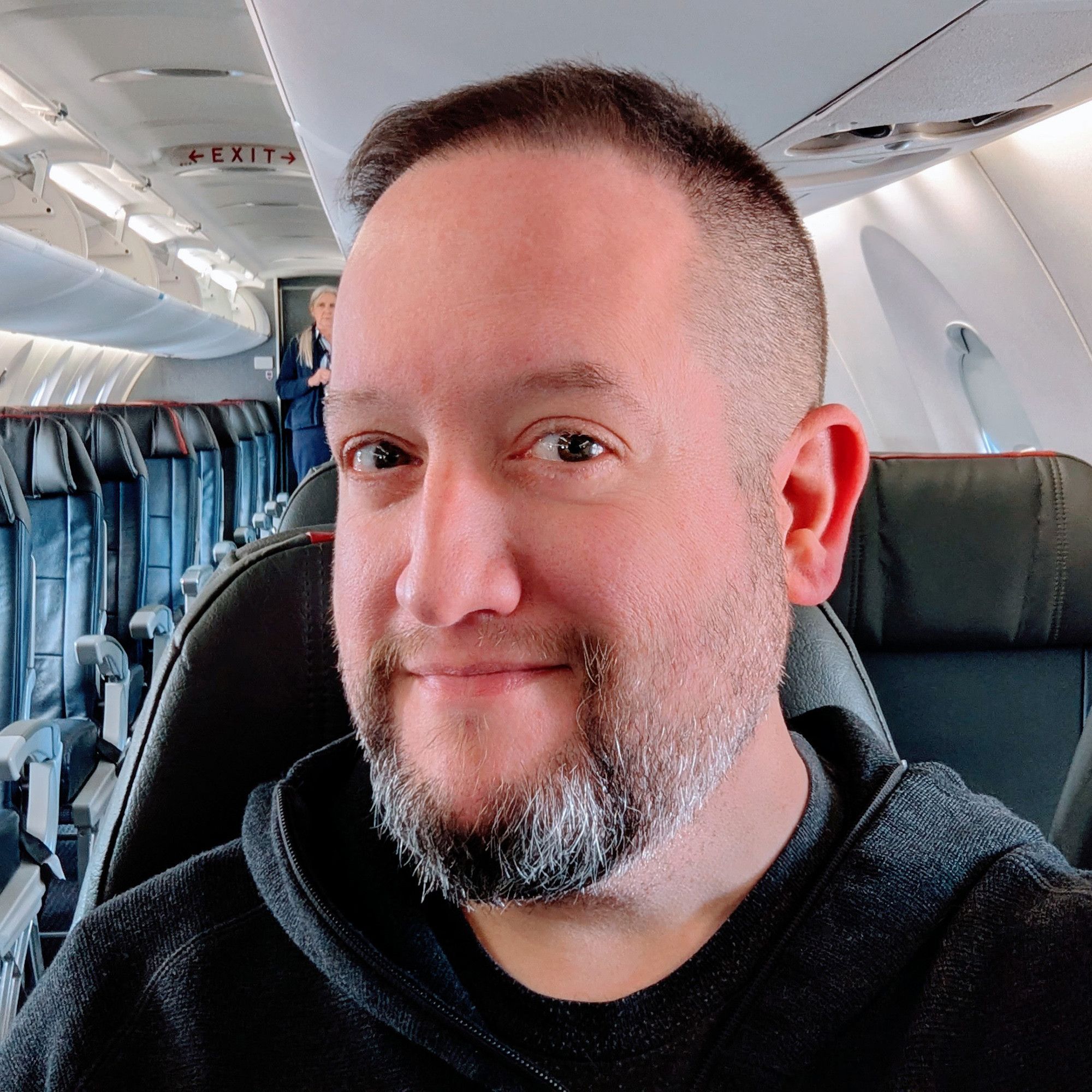 Selfie of me in my happy place... seated on an airplane.  I was the first passenger to board, and we're about to be at 35,000' in a world of bliss and endless possibilities.