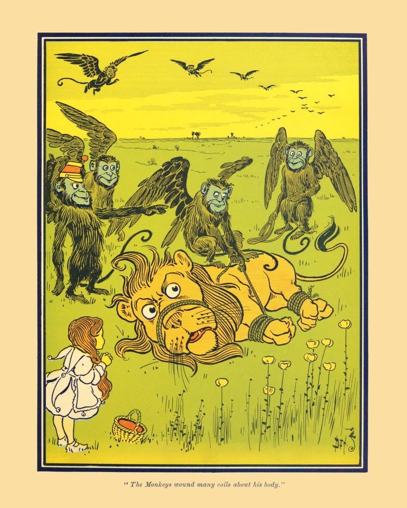 W.W. Denslow illustration from the original The Wonderful Wizard of Oz book. It depicts the Winged Monkeys having tied and bound the Cowardly Lion as a fretting Dorothy watches. The caption reads "The Monkeys wound many coils around his body."