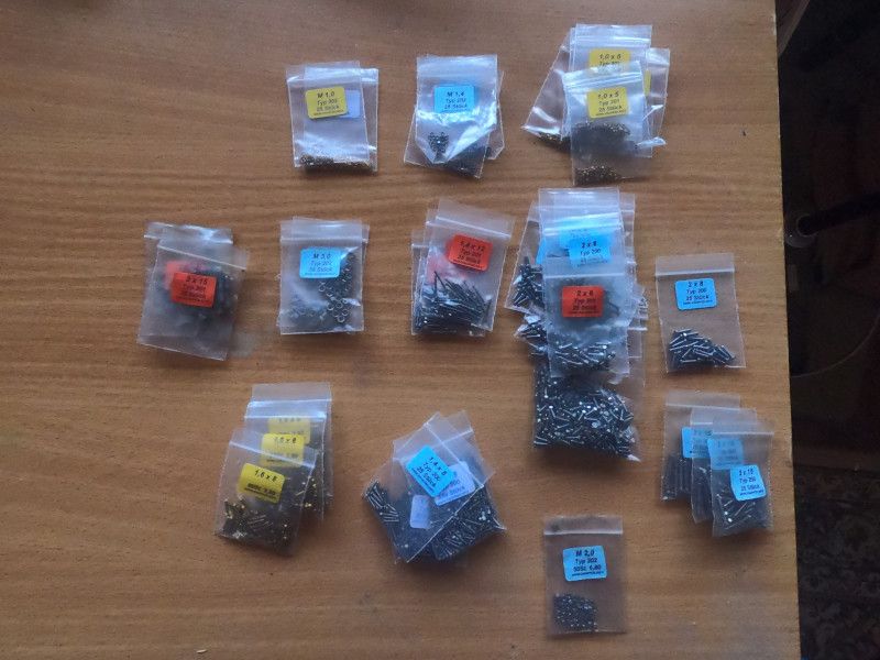 Photo of several bags of small fasteners, as described in the main post text.